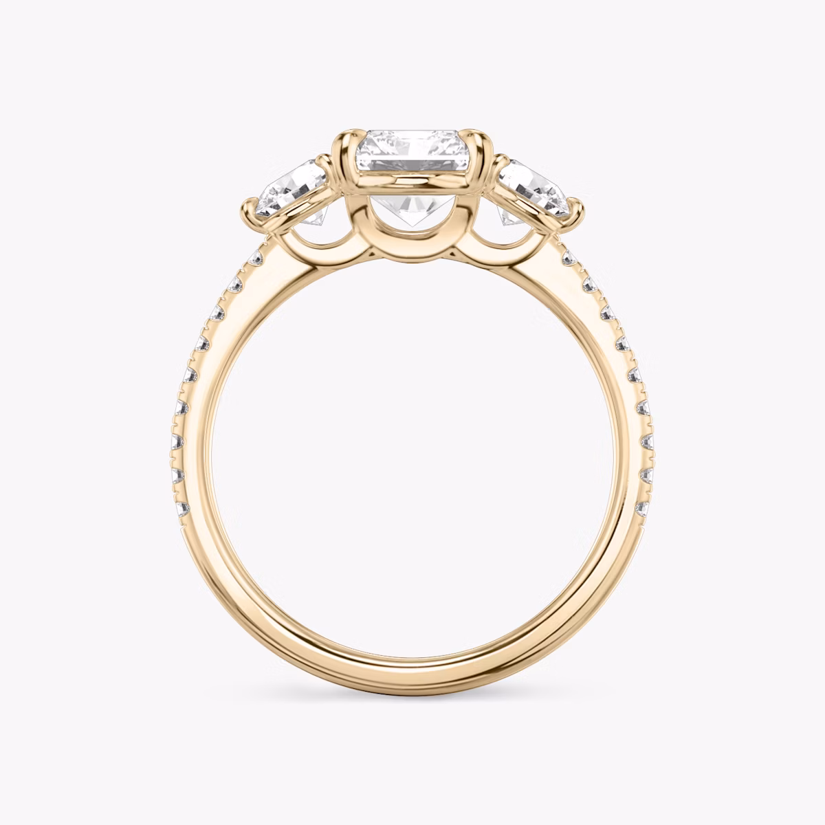 The Three Stone | Radiant | 14k | Rose Gold | bandAccent: Pavé | sideStoneCarat: 0.25ct | sideStoneShape: Round Brilliant | diamondOrientation: vertical | caratWeight: other