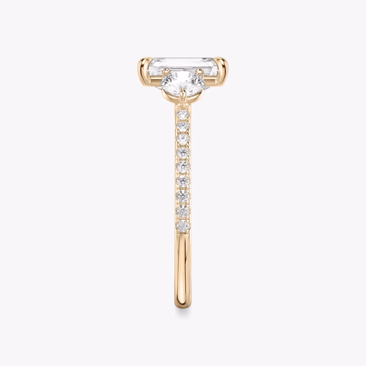 The Three Stone | Radiant | 14k | Rose Gold | bandAccent: Pavé | sideStoneCarat: 0.25ct | sideStoneShape: Round Brilliant | diamondOrientation: vertical | caratWeight: other