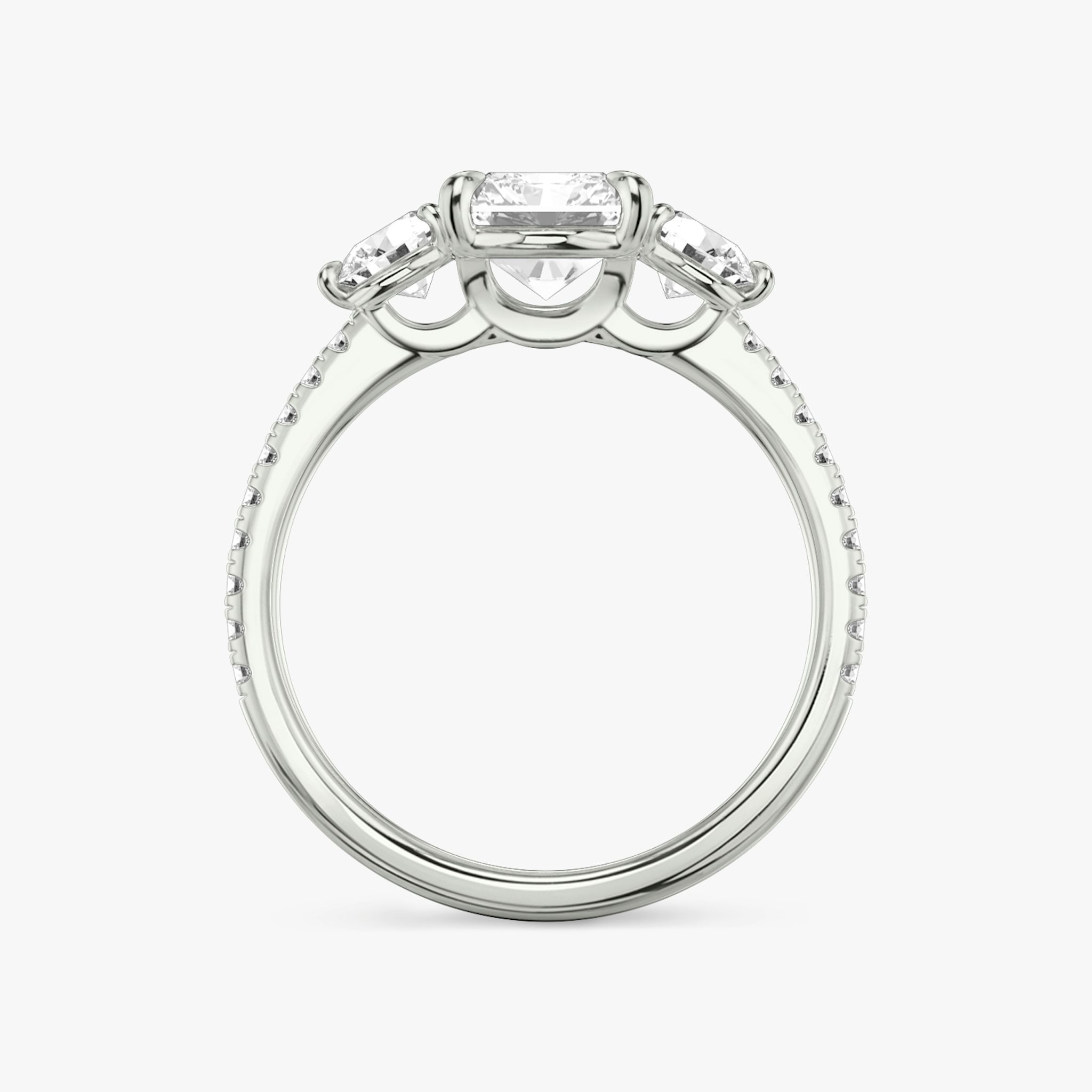 The Three Stone | Radiant | Platinum | bandAccent: Pavé | sideStoneCarat: 0.25ct | sideStoneShape: Round Brilliant | diamondOrientation: vertical | caratWeight: other