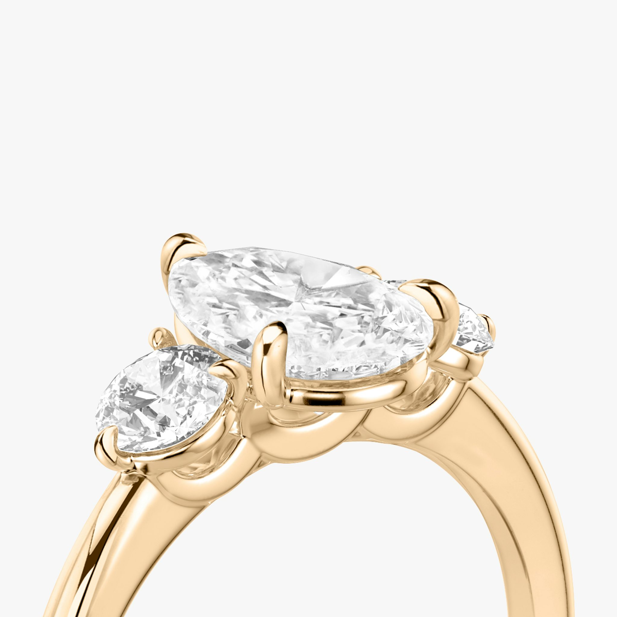 The Three Stone | Pear | 14k | Rose Gold | bandAccent: Plain | sideStoneCarat: 0.25ct | sideStoneShape: Round Brilliant | diamondOrientation: vertical | caratWeight: other