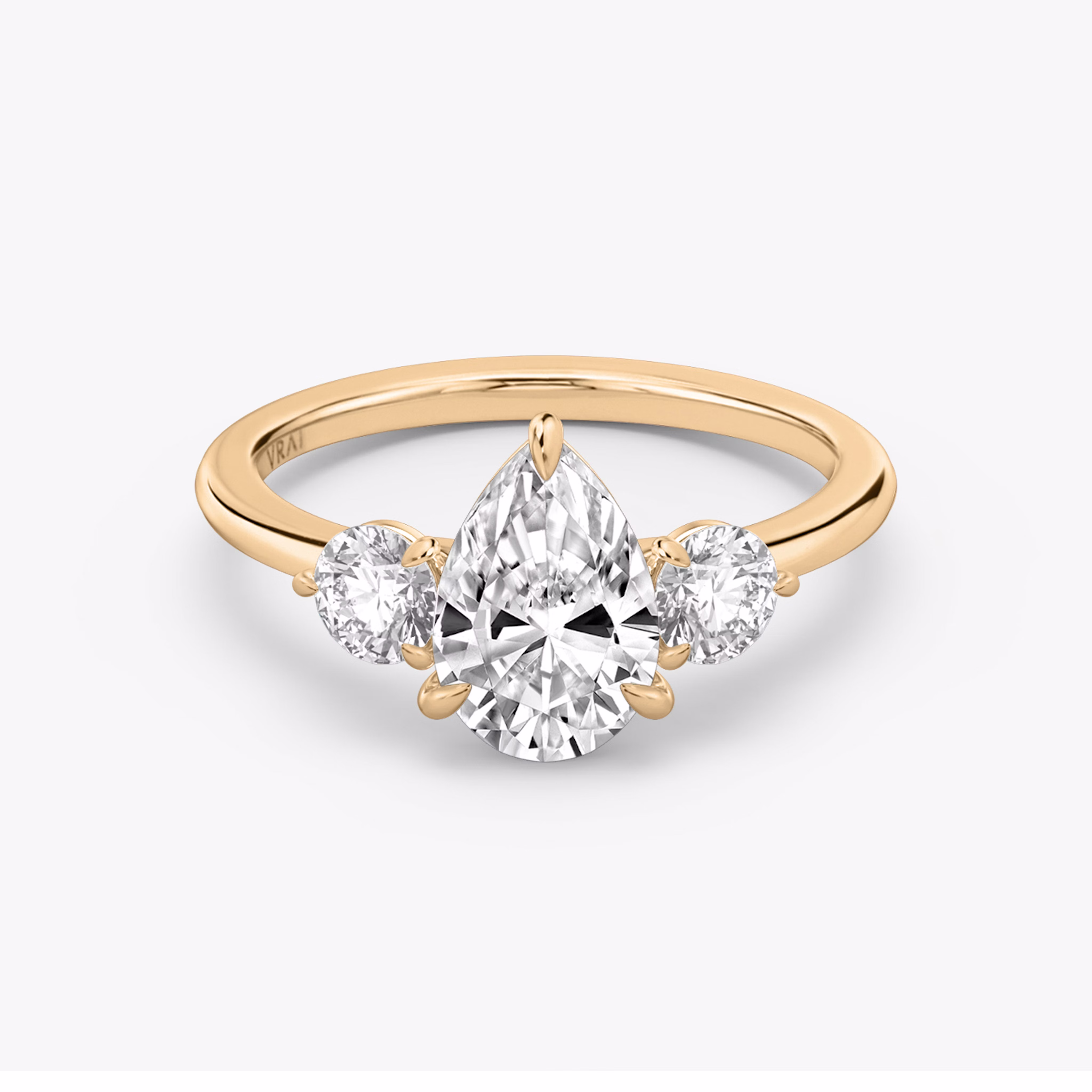 Three stone Pear Diamond Engagement Ring