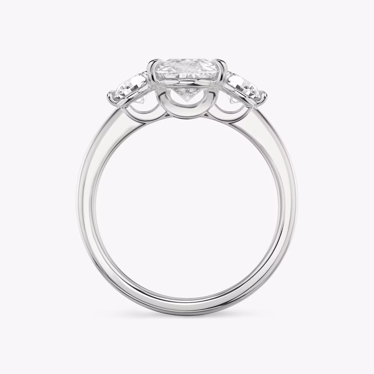 The Three Stone | Pear | Platinum | bandAccent: Plain | sideStoneCarat: 0.25ct | sideStoneShape: Round Brilliant | diamondOrientation: vertical | caratWeight: other