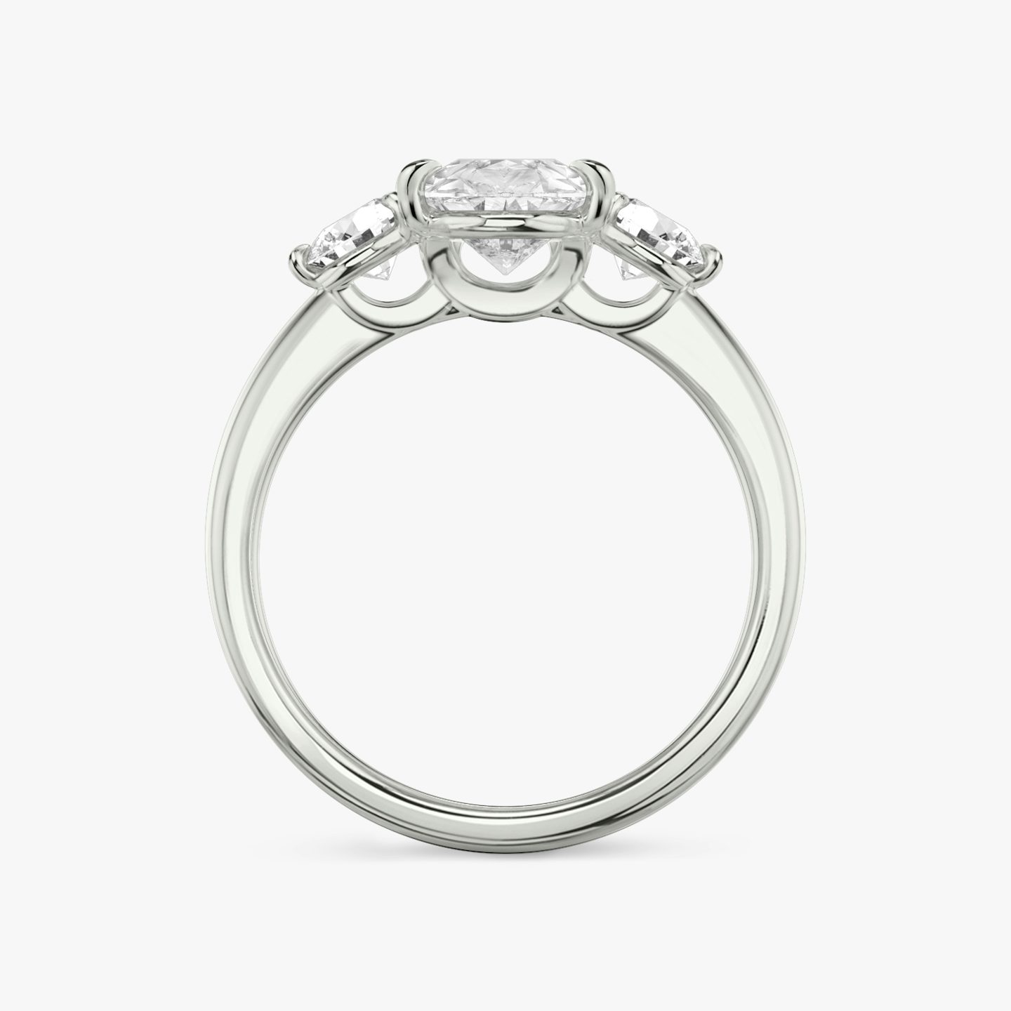 The Three Stone | Pear | 18k | White Gold | bandAccent: Plain | sideStoneCarat: 0.25ct | sideStoneShape: Round Brilliant | diamondOrientation: vertical | caratWeight: other