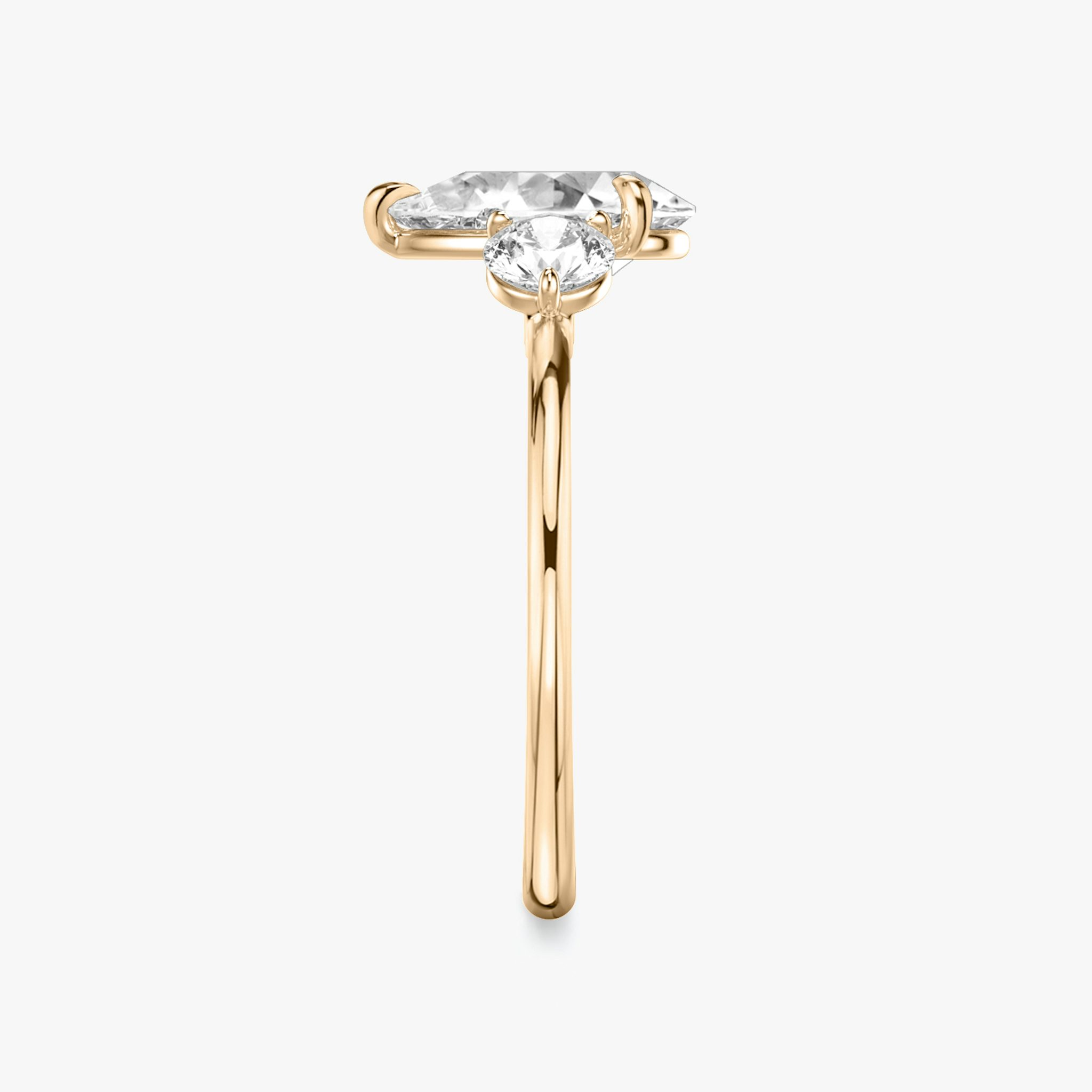 The Three Stone | Pear | 14k | Rose Gold | bandAccent: Plain | sideStoneCarat: 0.25ct | sideStoneShape: Round Brilliant | diamondOrientation: vertical | caratWeight: other