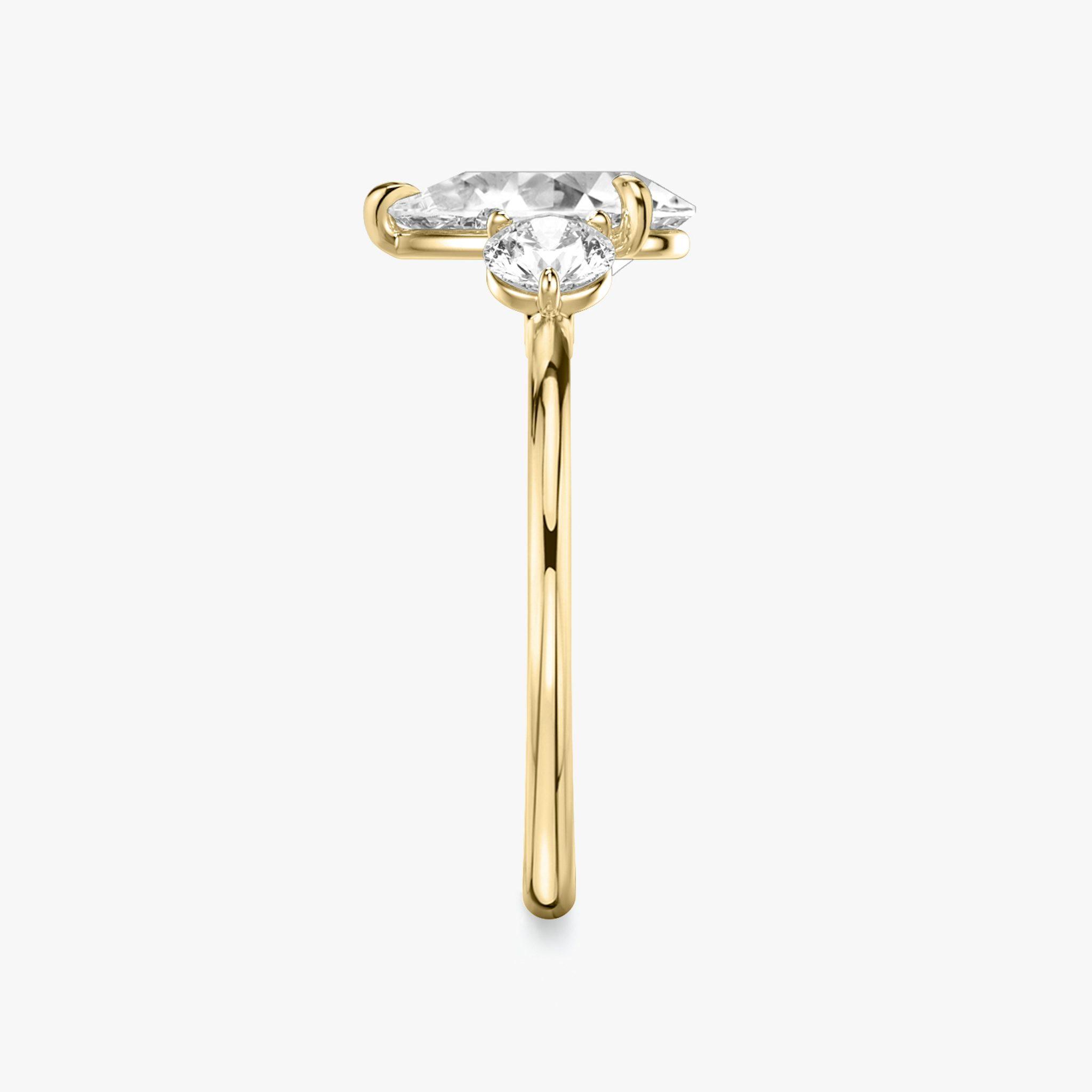 The Three Stone | Pear | 18k | Yellow Gold | bandAccent: Plain | sideStoneCarat: 0.25ct | sideStoneShape: Round Brilliant | diamondOrientation: vertical | caratWeight: other