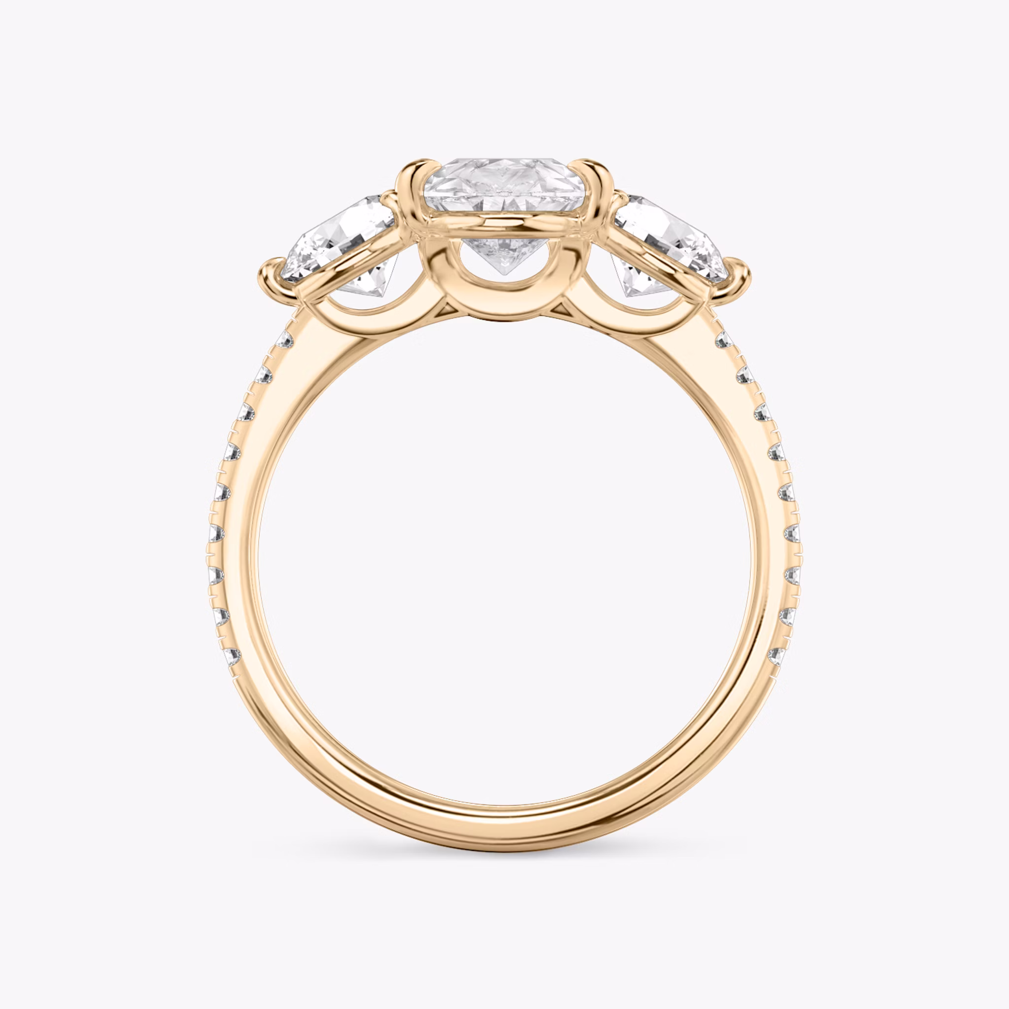 The Three Stone | Pear | 14k | Rose Gold | bandAccent: Pavé | sideStoneCarat: 0.50ct | sideStoneShape: Round Brilliant | diamondOrientation: vertical | caratWeight: other