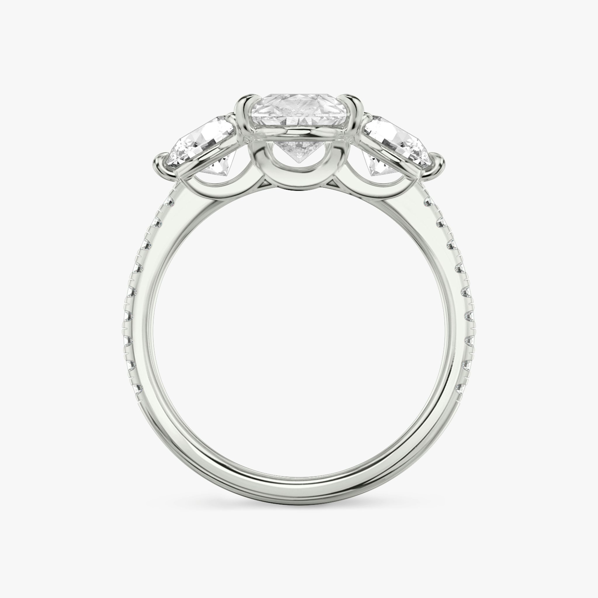 The Three Stone | Pear | Platinum | bandAccent: Pavé | sideStoneCarat: 0.50ct | sideStoneShape: Round Brilliant | diamondOrientation: vertical | caratWeight: other
