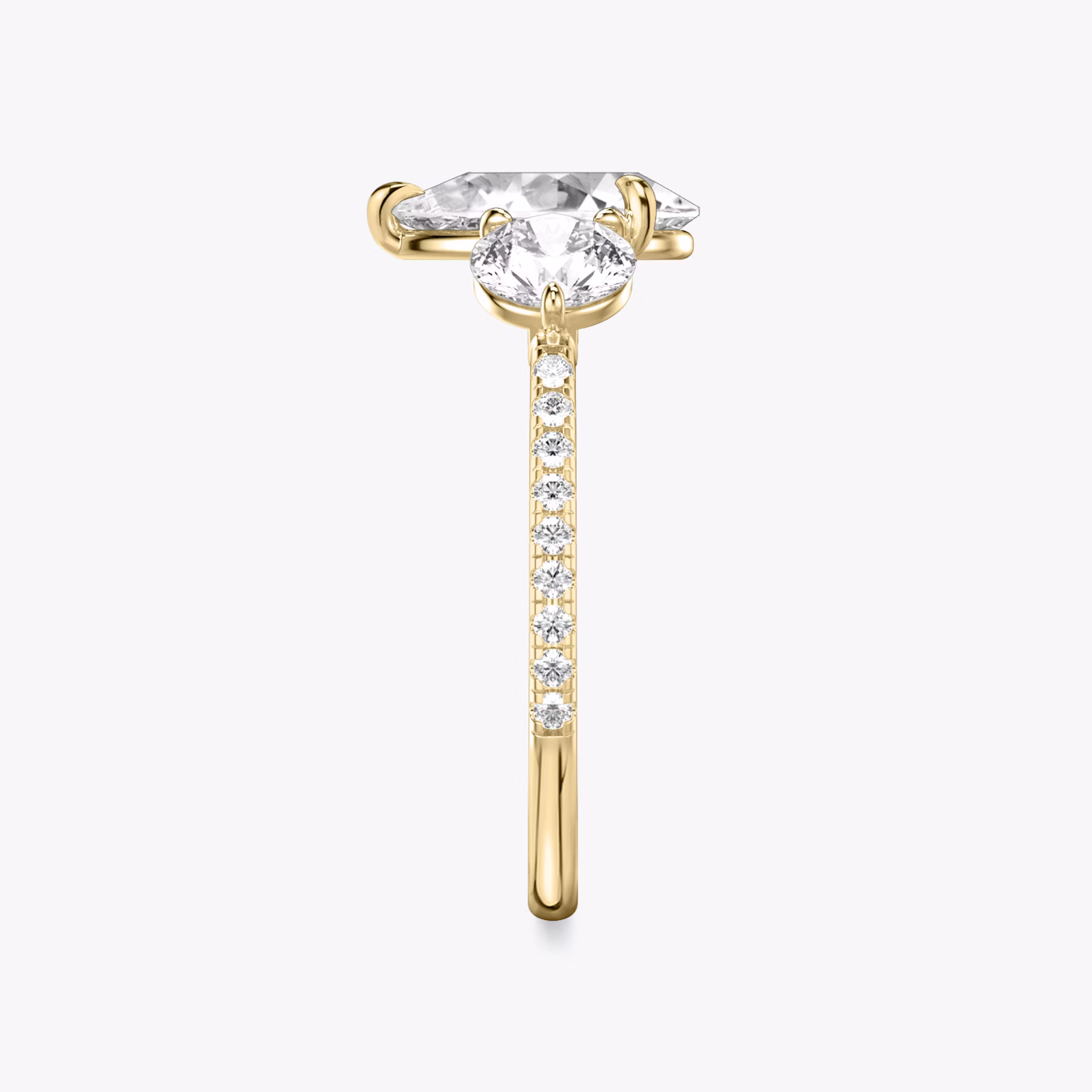 The Three Stone | Pear | 18k | Yellow Gold | bandAccent: Pavé | sideStoneCarat: 0.50ct | sideStoneShape: Round Brilliant | diamondOrientation: vertical | caratWeight: other