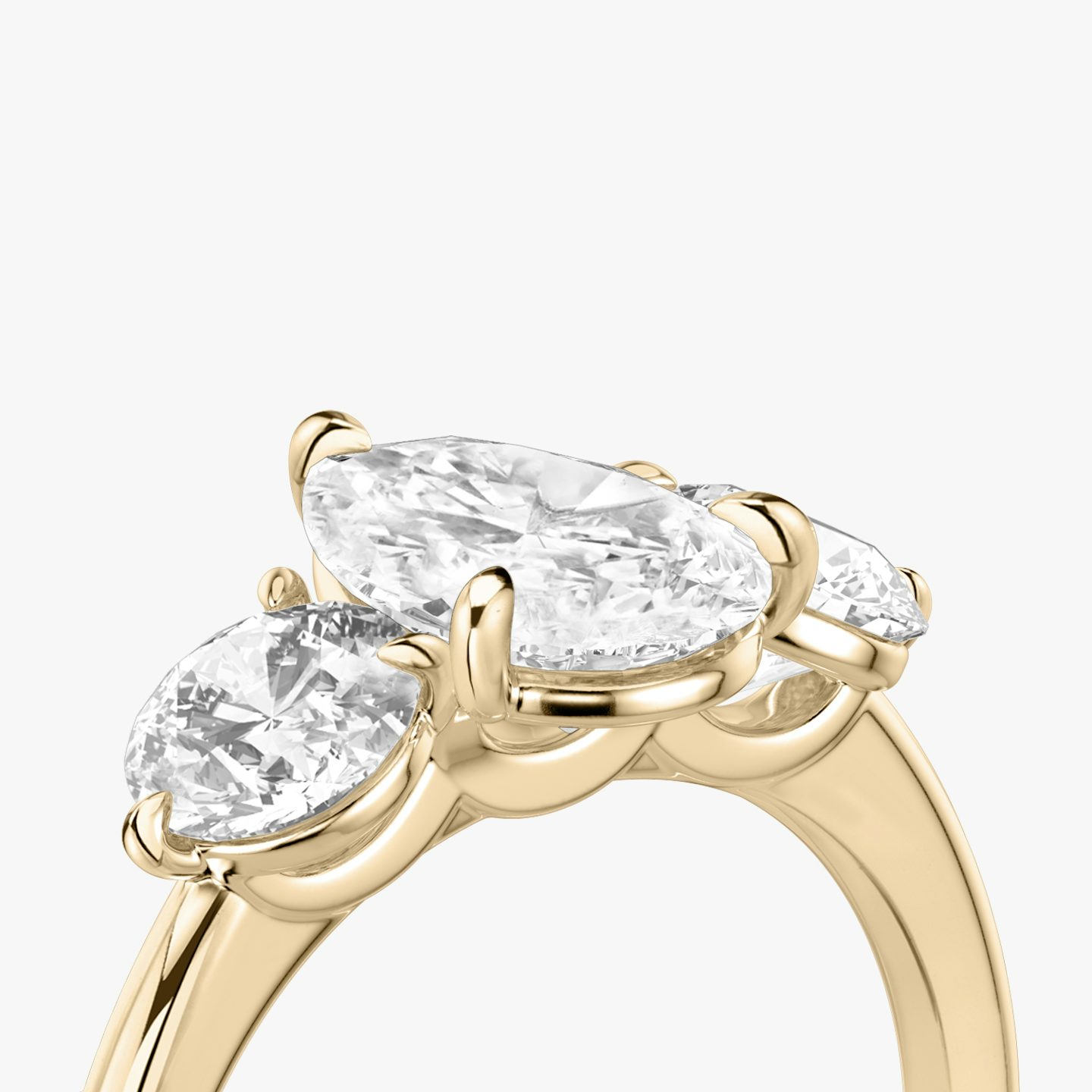 The Three Stone | Pear | 14k | Rose Gold | bandAccent: Plain | sideStoneCarat: 0.50ct | sideStoneShape: Round Brilliant | diamondOrientation: vertical | caratWeight: other