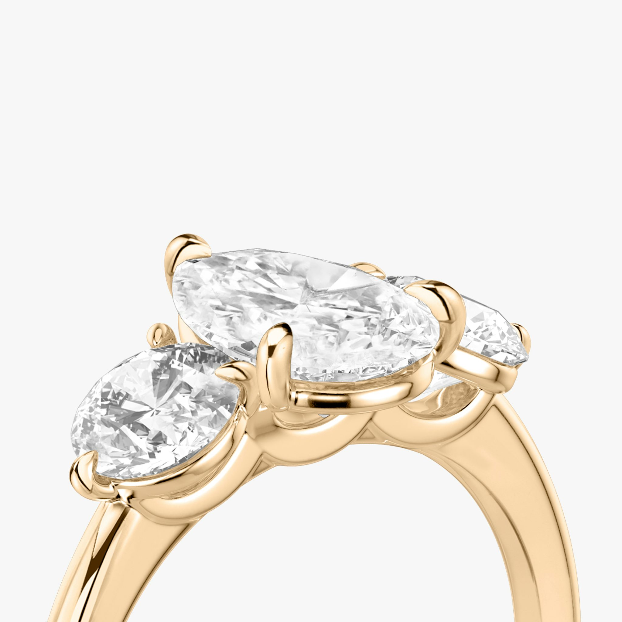 The Three Stone | Pear | 14k | Rose Gold | bandAccent: Plain | sideStoneCarat: 0.50ct | sideStoneShape: Round Brilliant | diamondOrientation: vertical | caratWeight: other