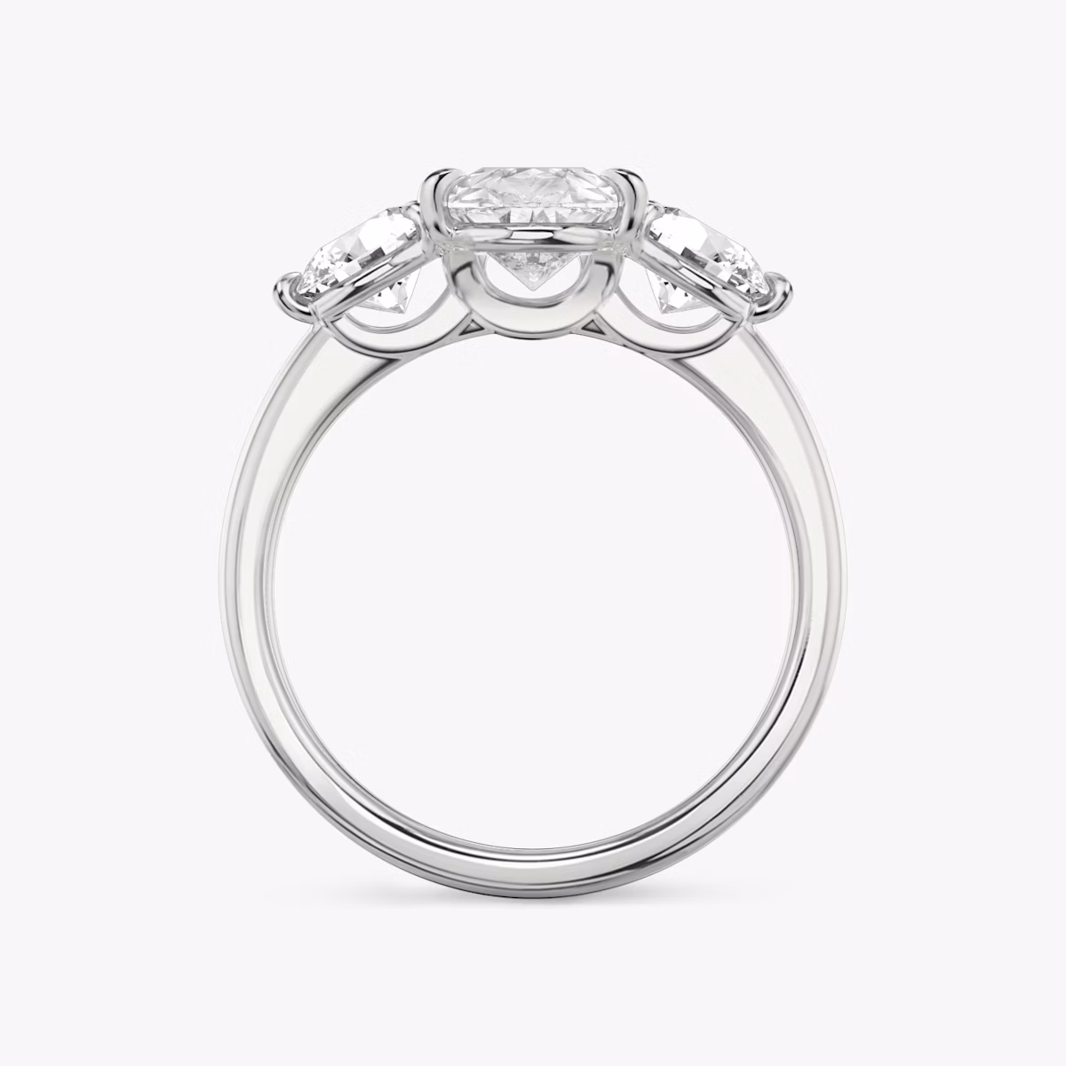 The Three Stone | Pear | Platinum | bandAccent: Plain | sideStoneCarat: 0.50ct | sideStoneShape: Round Brilliant | diamondOrientation: vertical | caratWeight: other