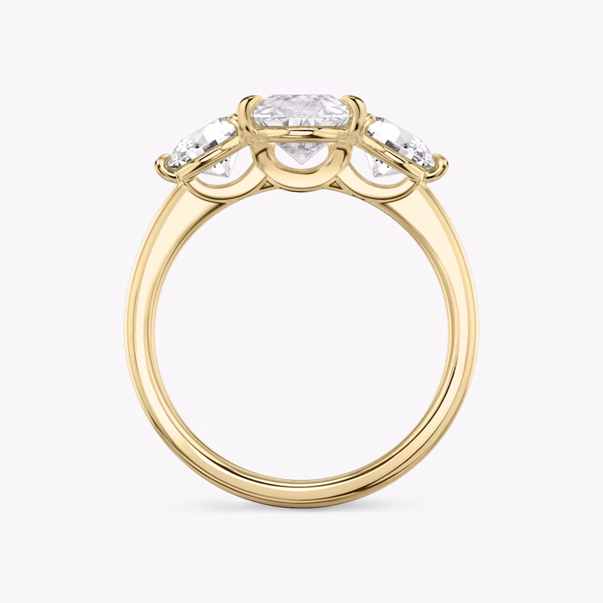 The Three Stone | Pear | 18k | Yellow Gold | bandAccent: Plain | sideStoneCarat: 0.50ct | sideStoneShape: Round Brilliant | diamondOrientation: vertical | caratWeight: other