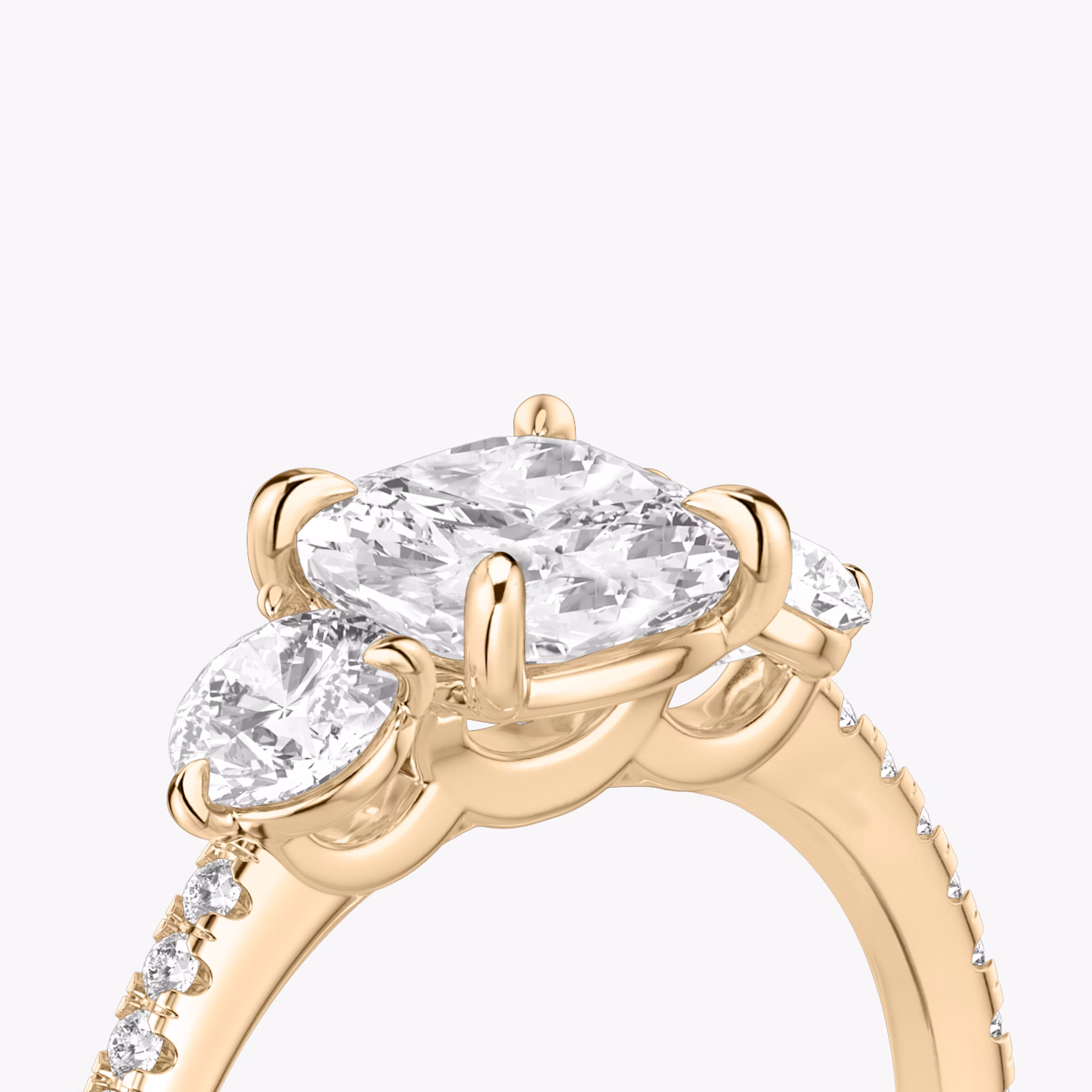 The Three Stone | Cushion | 14k | Rose Gold | bandAccent: Pavé | sideStoneCarat: 0.25ct | sideStoneShape: Round Brilliant | diamondOrientation: vertical | caratWeight: other