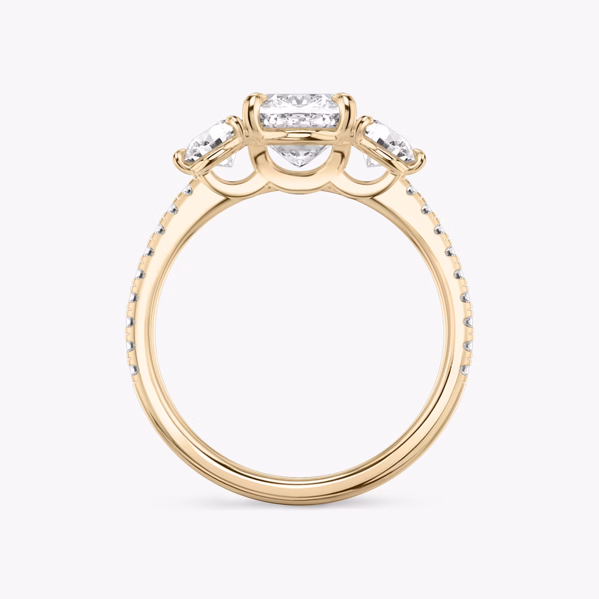 The Three Stone | Cushion | 14k | Rose Gold | bandAccent: Pavé | sideStoneCarat: 0.25ct | sideStoneShape: Round Brilliant | diamondOrientation: vertical | caratWeight: other