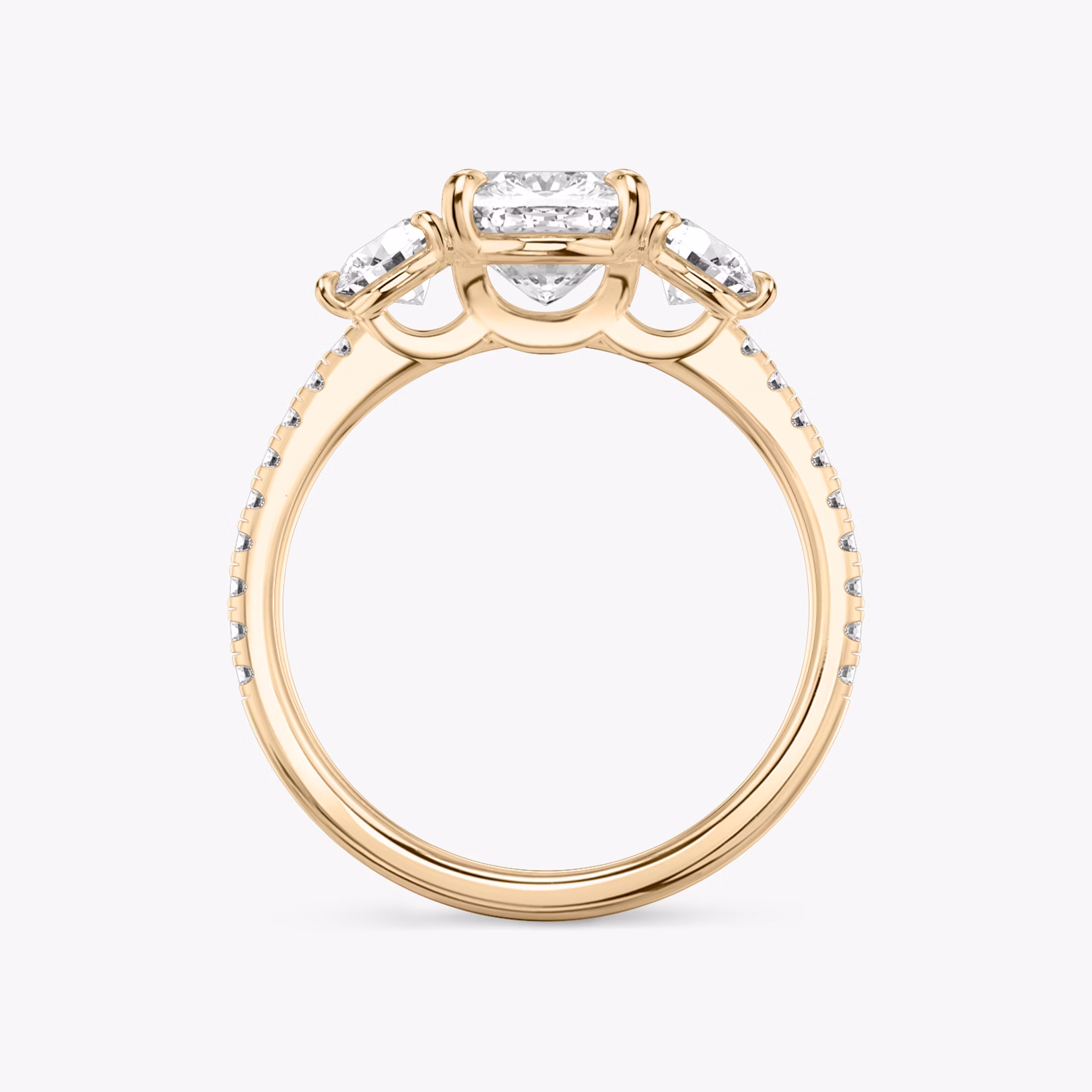 The Three Stone | Cushion | 14k | Rose Gold | bandAccent: Pavé | sideStoneCarat: 0.25ct | sideStoneShape: Round Brilliant | diamondOrientation: vertical | caratWeight: other