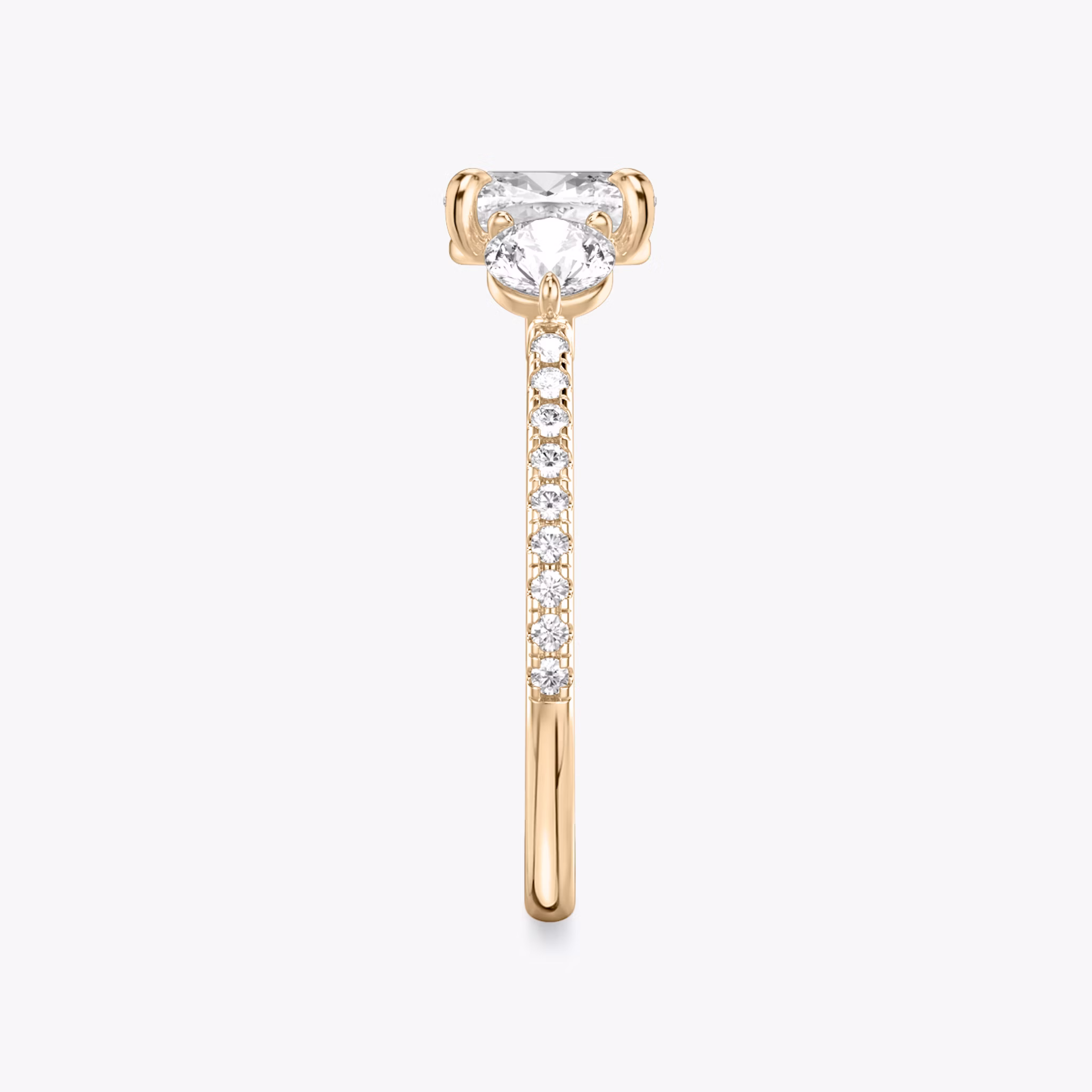The Three Stone | Cushion | 14k | Rose Gold | bandAccent: Pavé | sideStoneCarat: 0.25ct | sideStoneShape: Round Brilliant | diamondOrientation: vertical | caratWeight: other