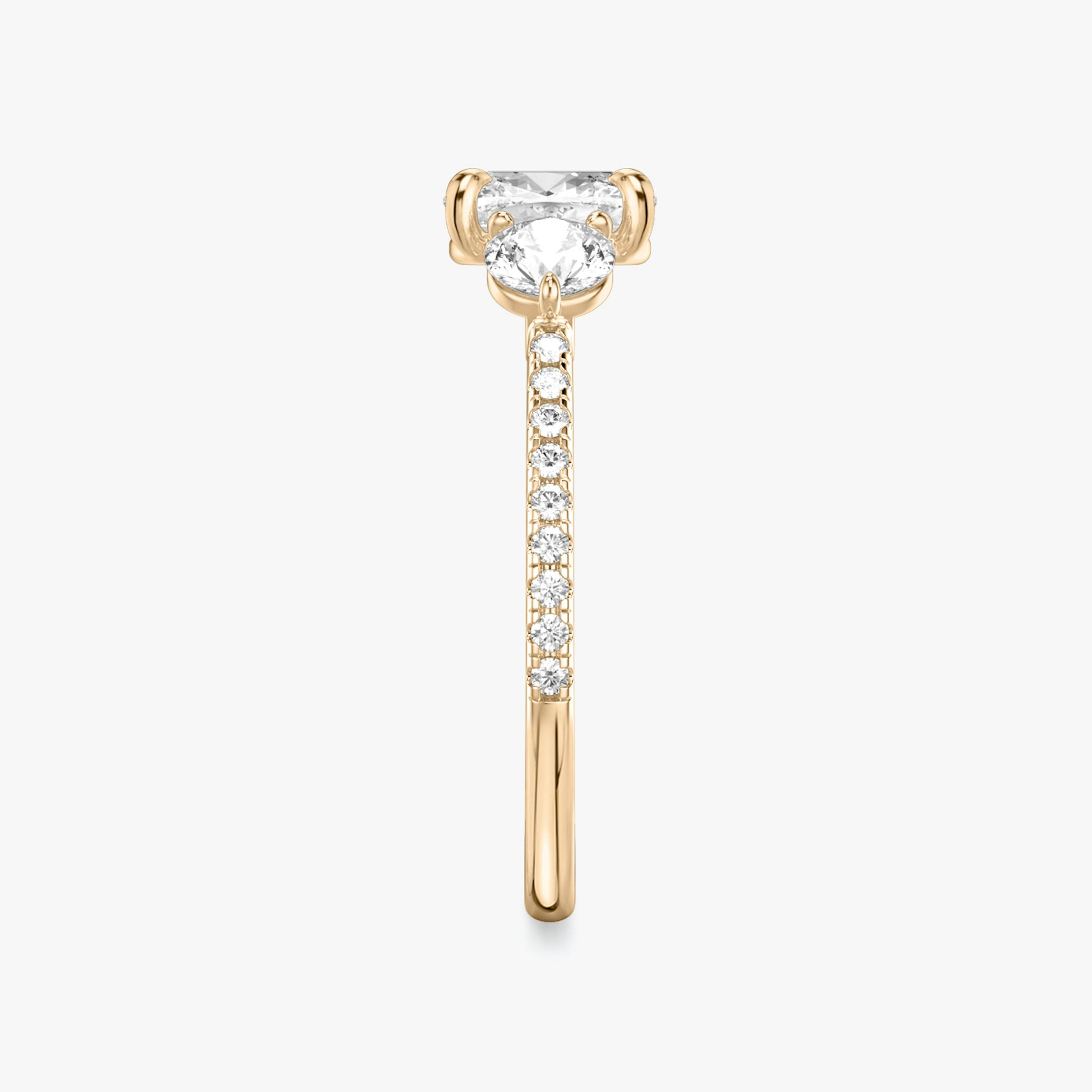 The Three Stone | Cushion | 14k | Rose Gold | bandAccent: Pavé | sideStoneCarat: 0.25ct | sideStoneShape: Round Brilliant | diamondOrientation: vertical | caratWeight: other