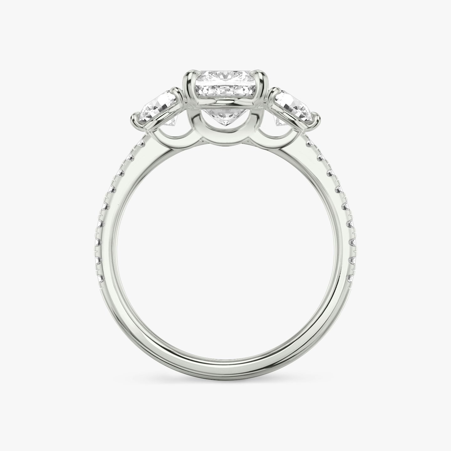 The Three Stone | Cushion | 18k | White Gold | bandAccent: Pavé | sideStoneCarat: 0.25ct | sideStoneShape: Round Brilliant | diamondOrientation: vertical | caratWeight: other