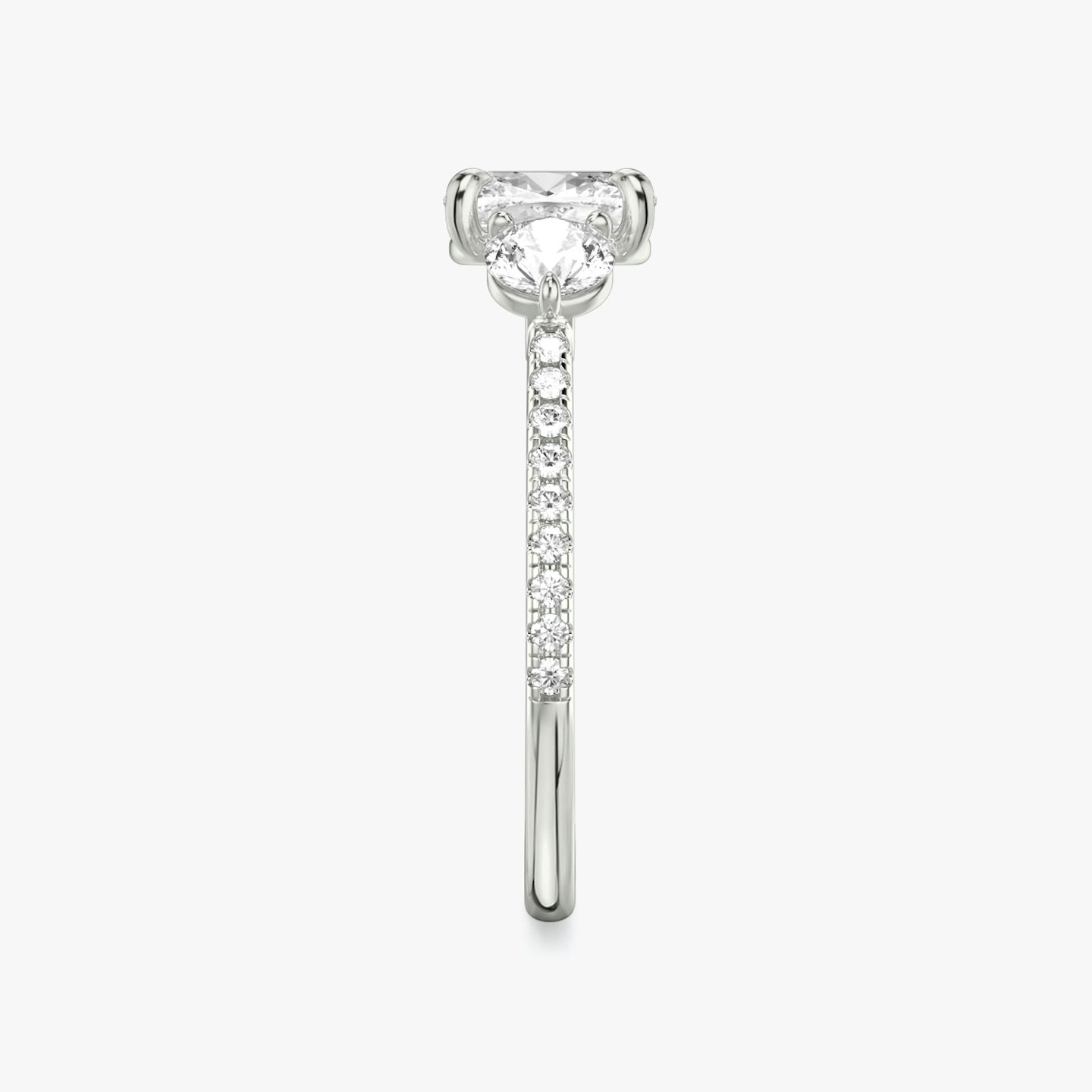The Three Stone | Cushion | 18k | White Gold | bandAccent: Pavé | sideStoneCarat: 0.25ct | sideStoneShape: Round Brilliant | diamondOrientation: vertical | caratWeight: other