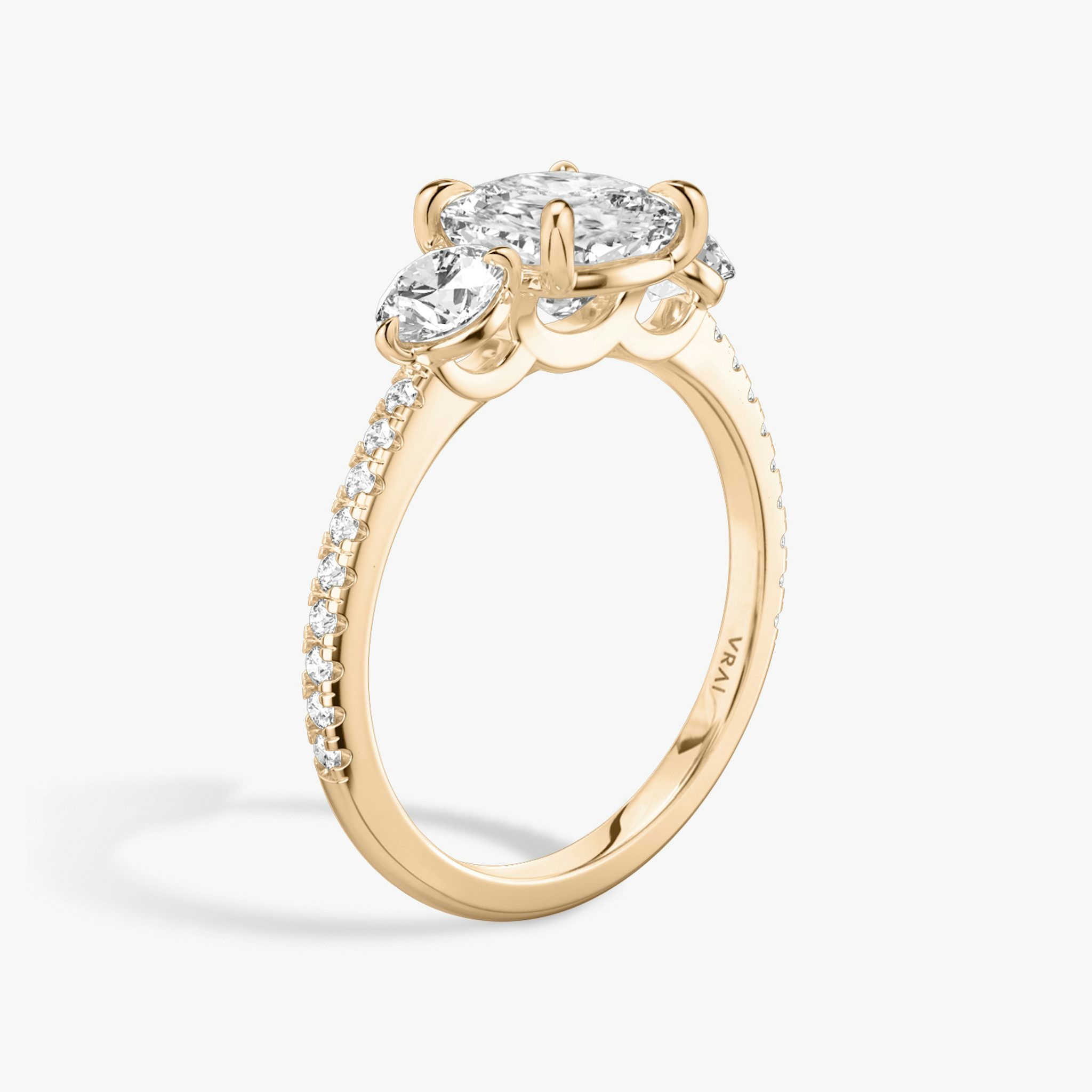 The Three Stone | Cushion | 14k | Rose Gold | bandAccent: Pavé | sideStoneCarat: 0.25ct | sideStoneShape: Round Brilliant | diamondOrientation: vertical | caratWeight: other