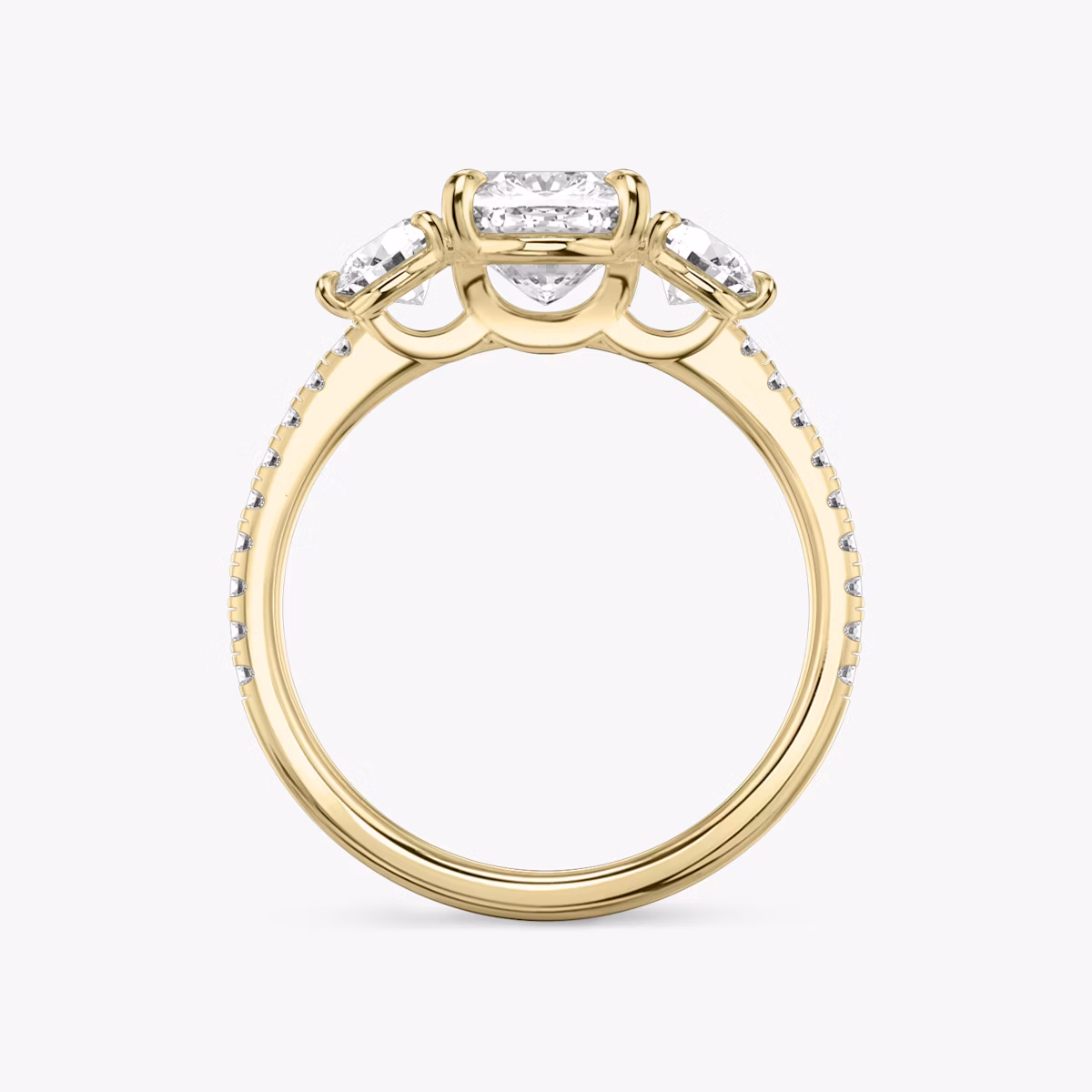 The Three Stone | Cushion | 18k | Yellow Gold | bandAccent: Pavé | sideStoneCarat: 0.25ct | sideStoneShape: Round Brilliant | diamondOrientation: vertical | caratWeight: other