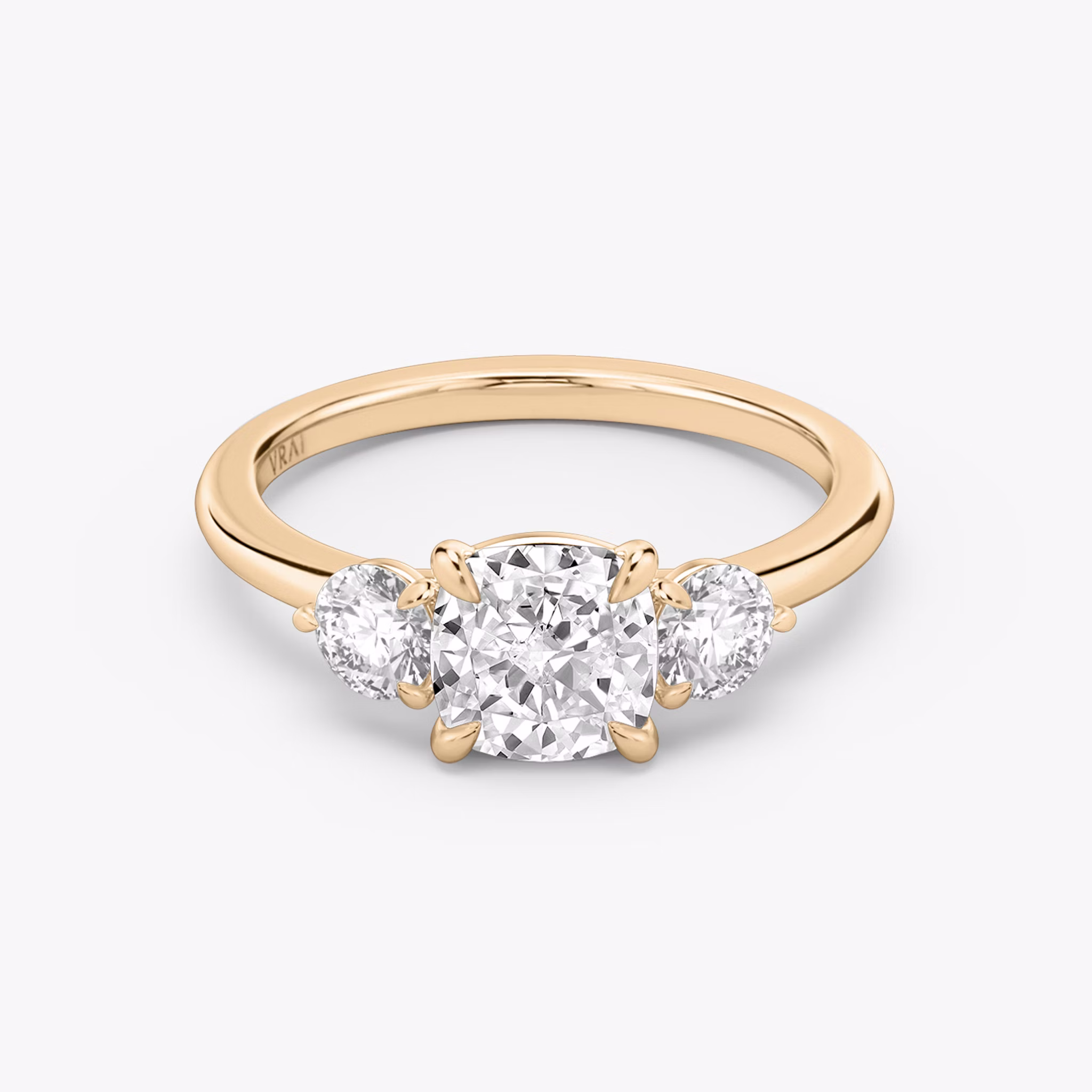 The Three Stone | Cushion | 14k | Rose Gold | bandAccent: Plain | sideStoneCarat: 0.25ct | sideStoneShape: Round Brilliant | diamondOrientation: vertical | caratWeight: other