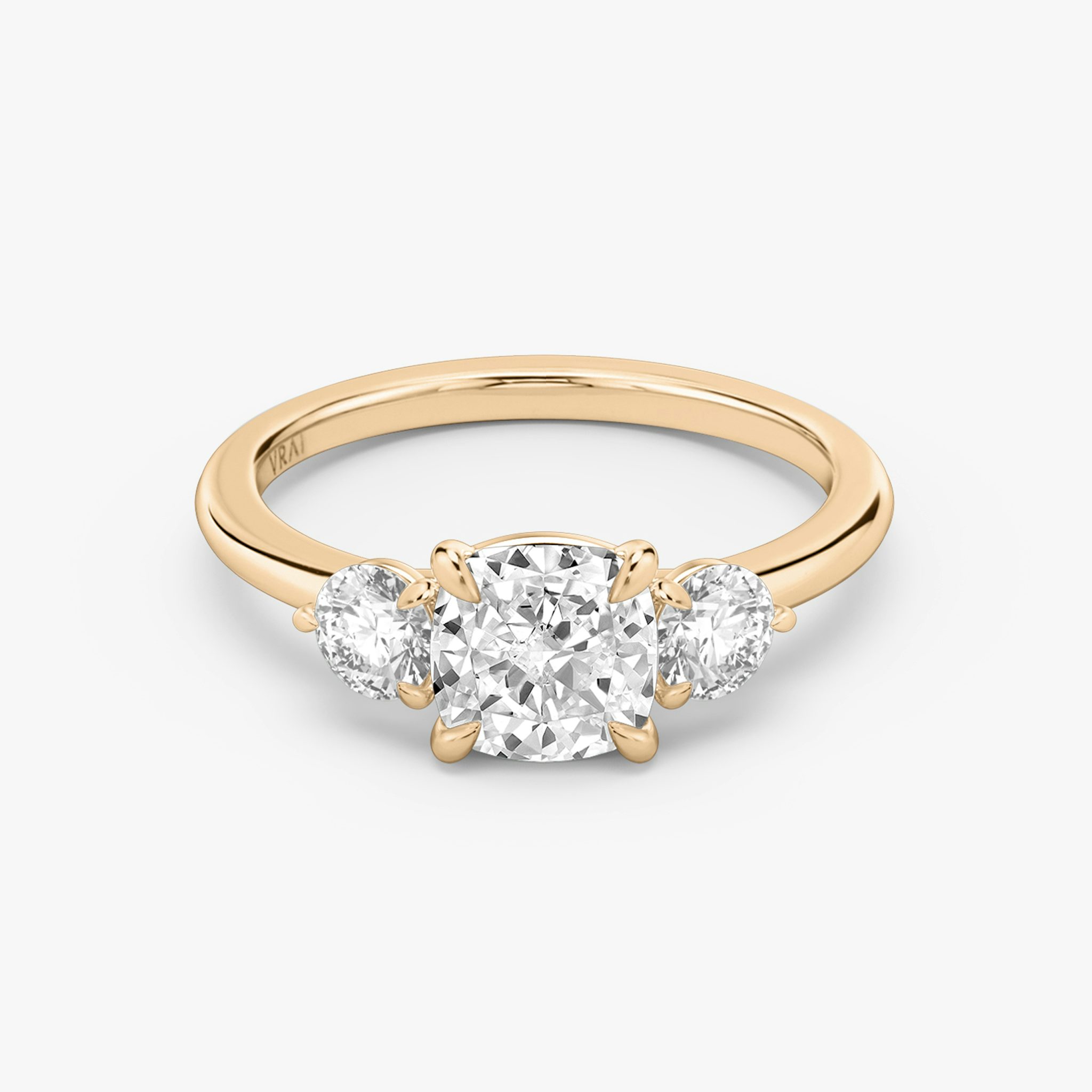 The Three Stone | Cushion | 14k | Rose Gold | bandAccent: Plain | sideStoneCarat: 0.25ct | sideStoneShape: Round Brilliant | diamondOrientation: vertical | caratWeight: other