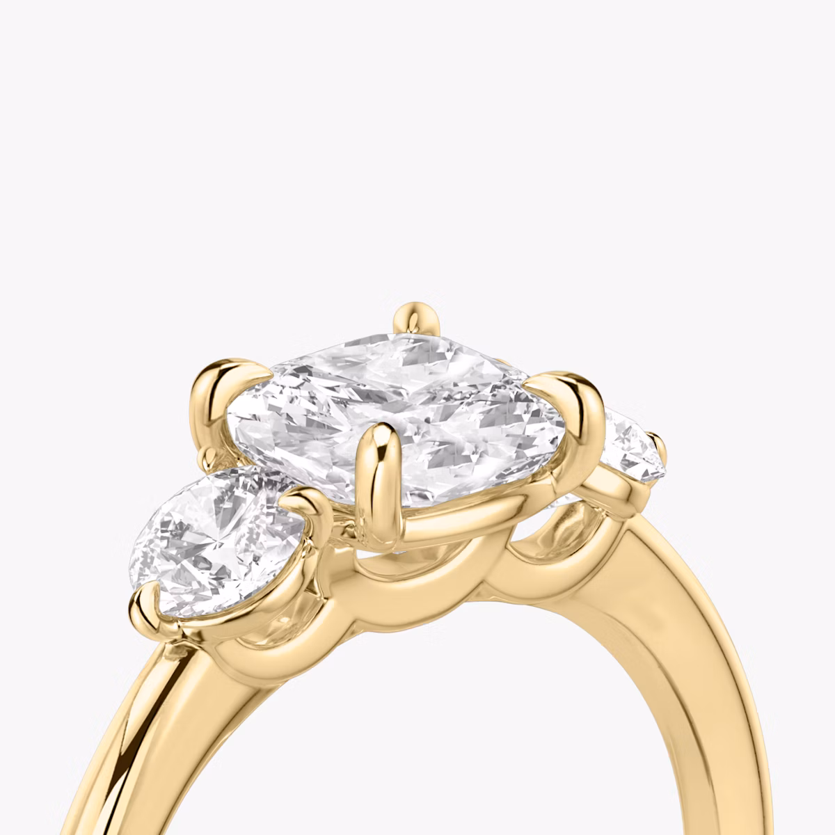 The Three Stone | Cushion | 18k | Yellow Gold | bandAccent: Plain | sideStoneCarat: 0.25ct | sideStoneShape: Round Brilliant | diamondOrientation: vertical | caratWeight: other
