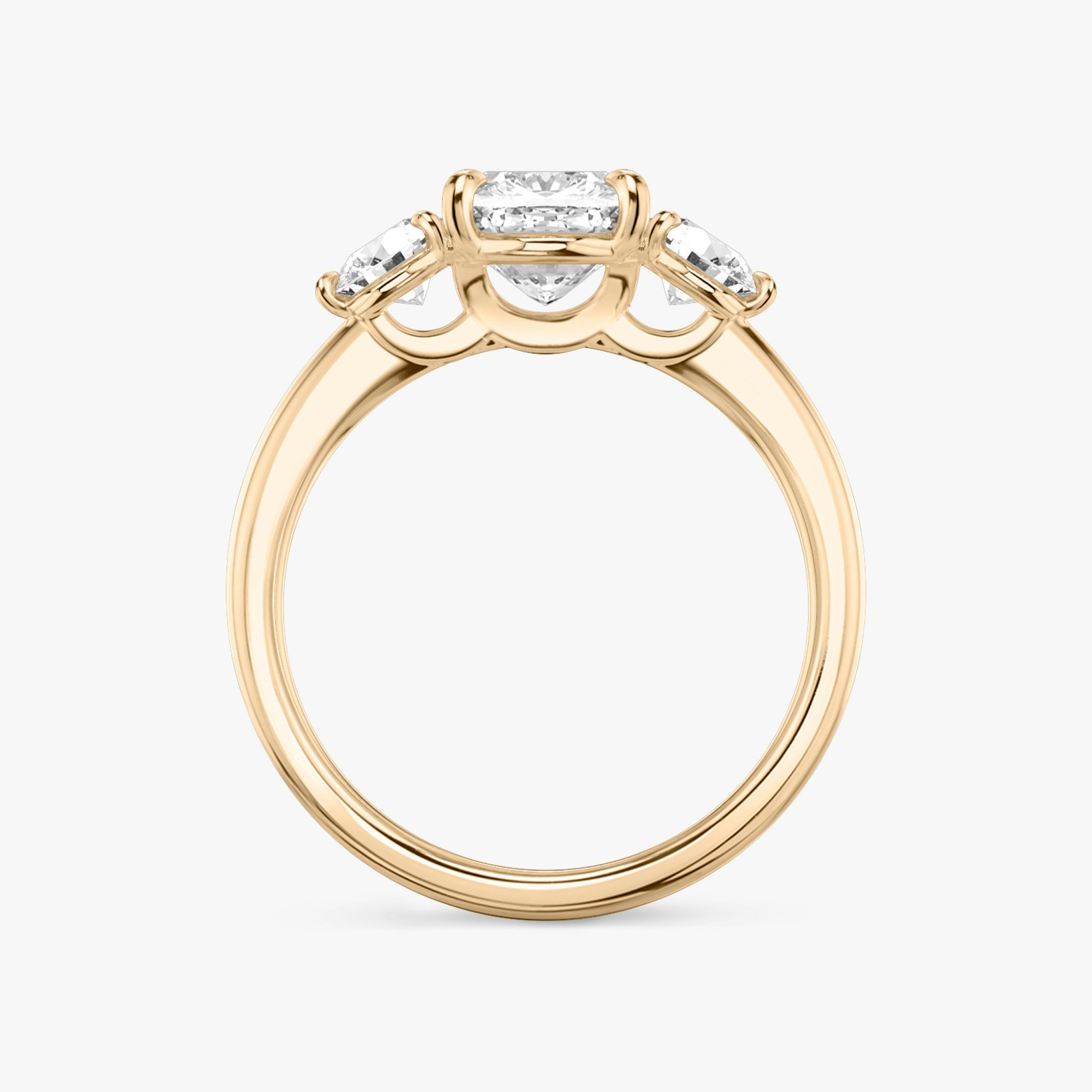 The Three Stone | Cushion | 14k | Rose Gold | bandAccent: Plain | sideStoneCarat: 0.25ct | sideStoneShape: Round Brilliant | diamondOrientation: vertical | caratWeight: other
