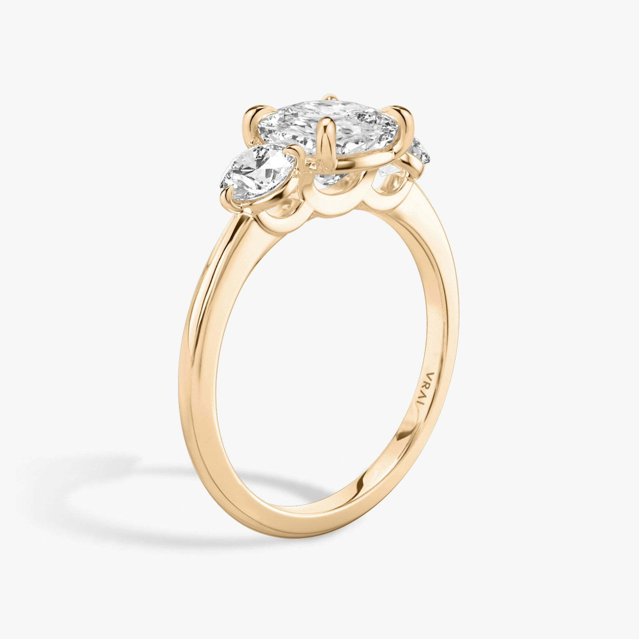 The Three Stone | Cushion | 14k | Rose Gold | bandAccent: Plain | sideStoneCarat: 0.25ct | sideStoneShape: Round Brilliant | diamondOrientation: vertical | caratWeight: other