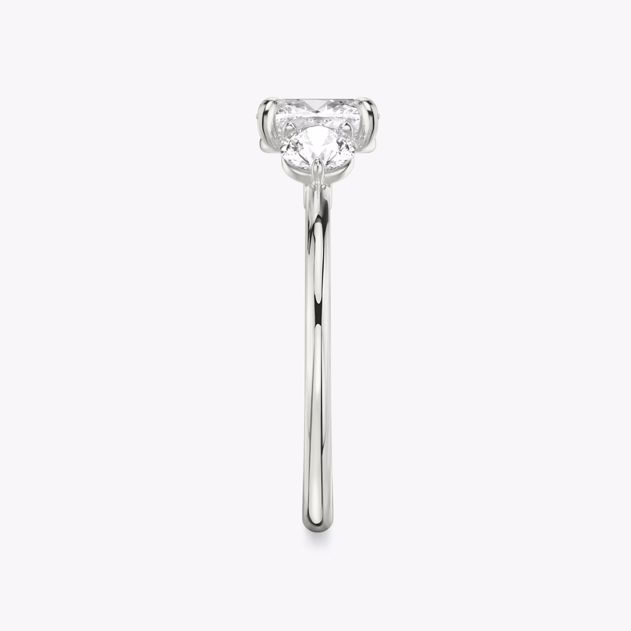 The Three Stone | Cushion | Platinum | bandAccent: Plain | sideStoneCarat: 0.25ct | sideStoneShape: Round Brilliant | diamondOrientation: vertical | caratWeight: other