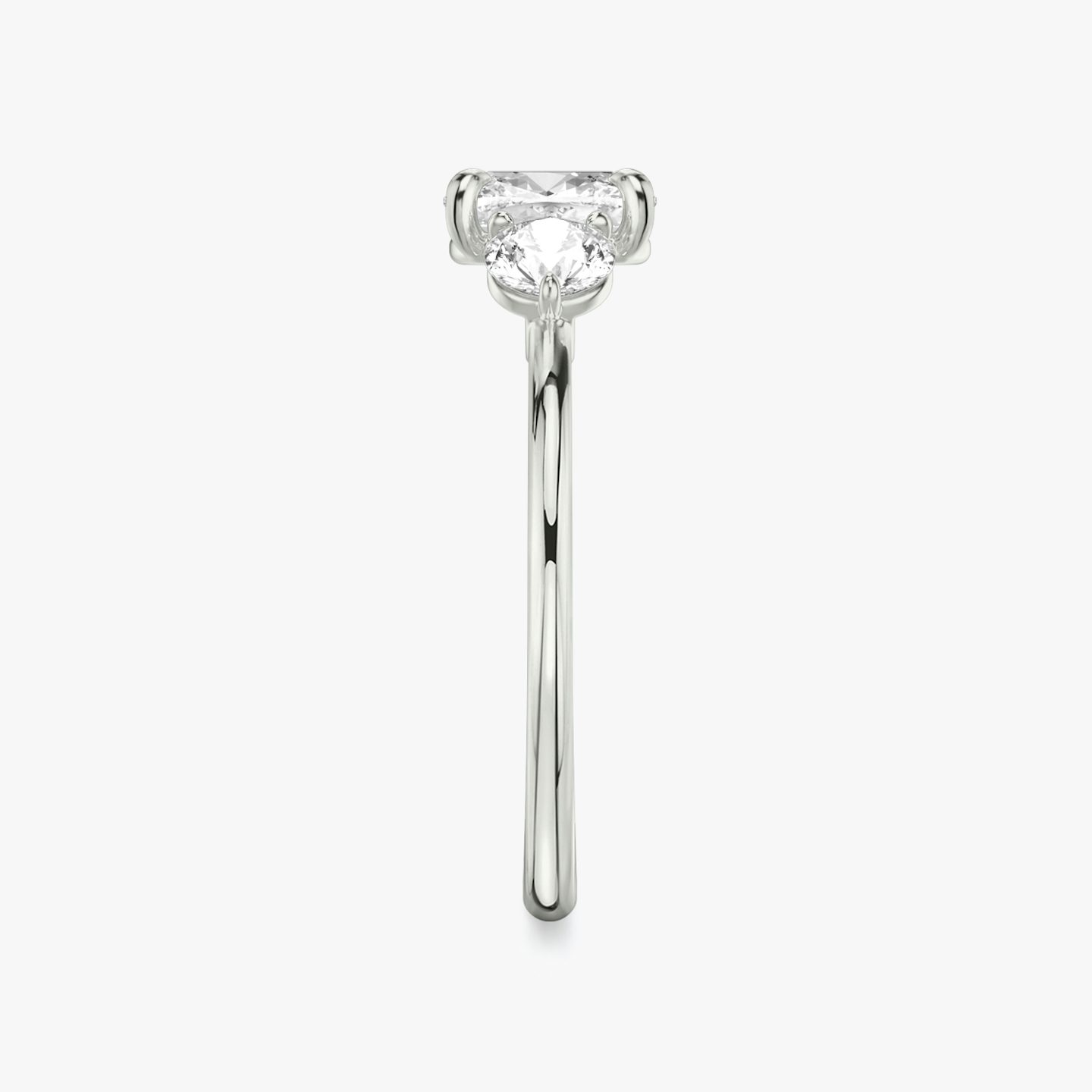 The Three Stone | Cushion | Platinum | bandAccent: Plain | sideStoneCarat: 0.25ct | sideStoneShape: Round Brilliant | diamondOrientation: vertical | caratWeight: other