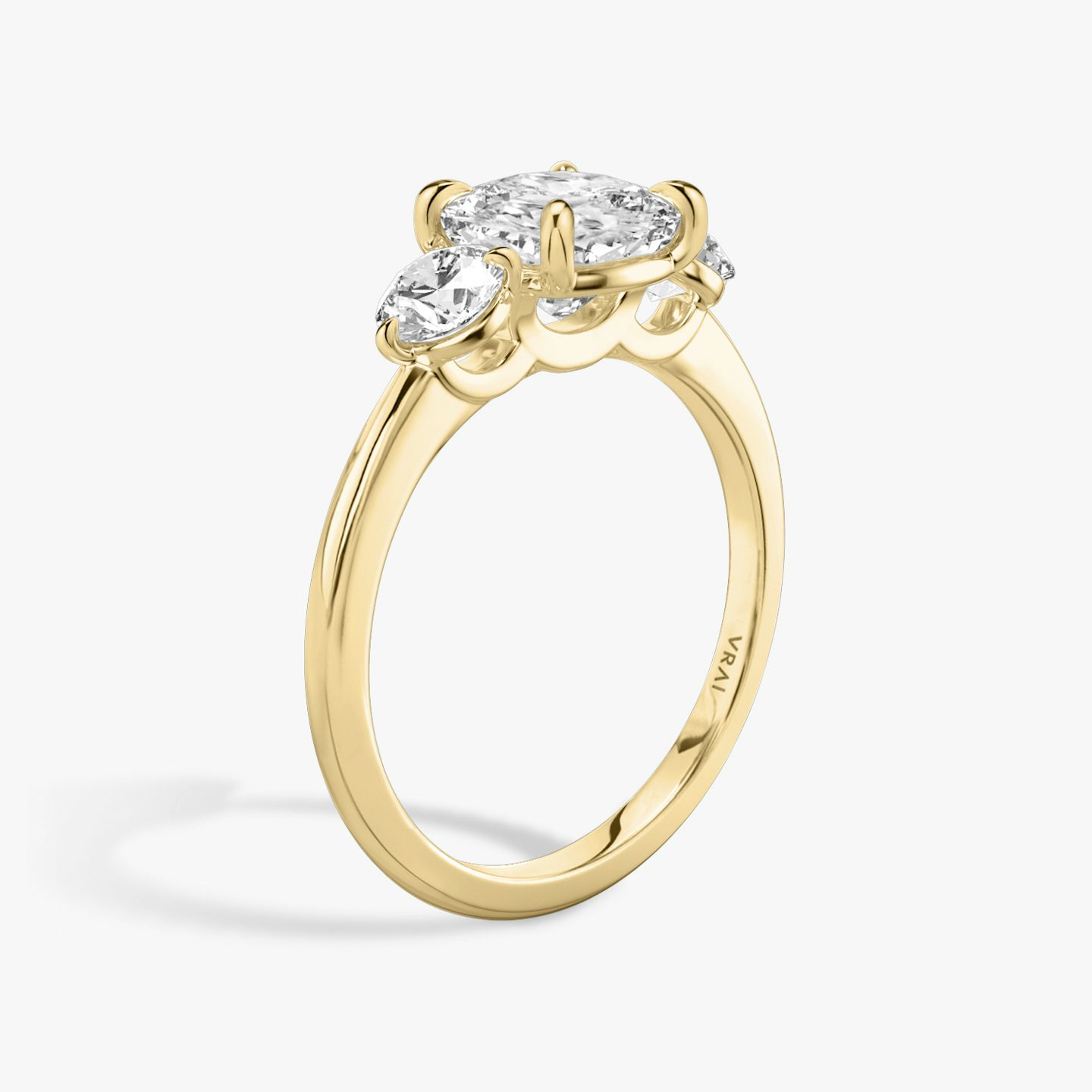The Three Stone | Cushion | 18k | Yellow Gold | bandAccent: Plain | sideStoneCarat: 0.25ct | sideStoneShape: Round Brilliant | diamondOrientation: vertical | caratWeight: other