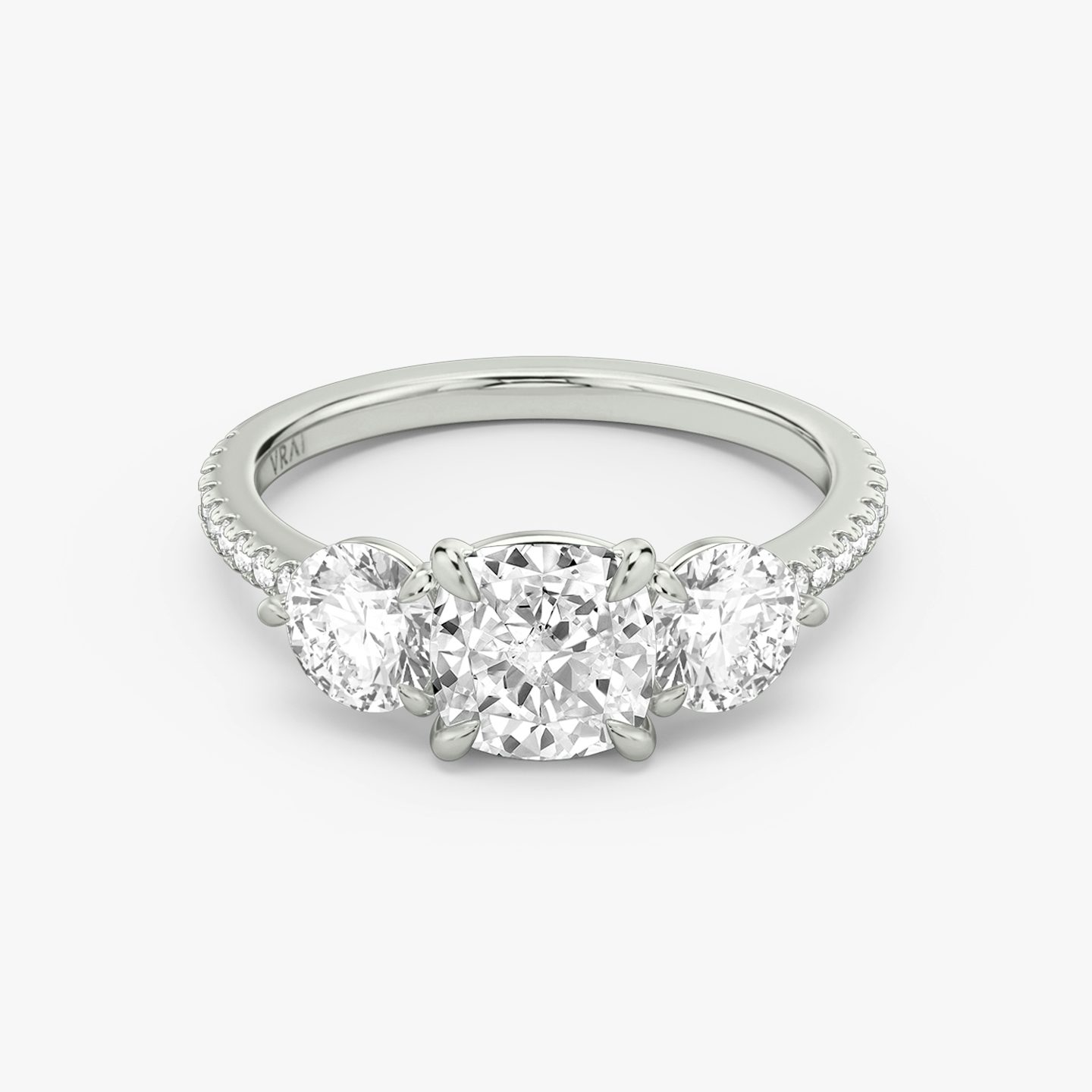 Three Stone Cushion and Round Brilliant RIng