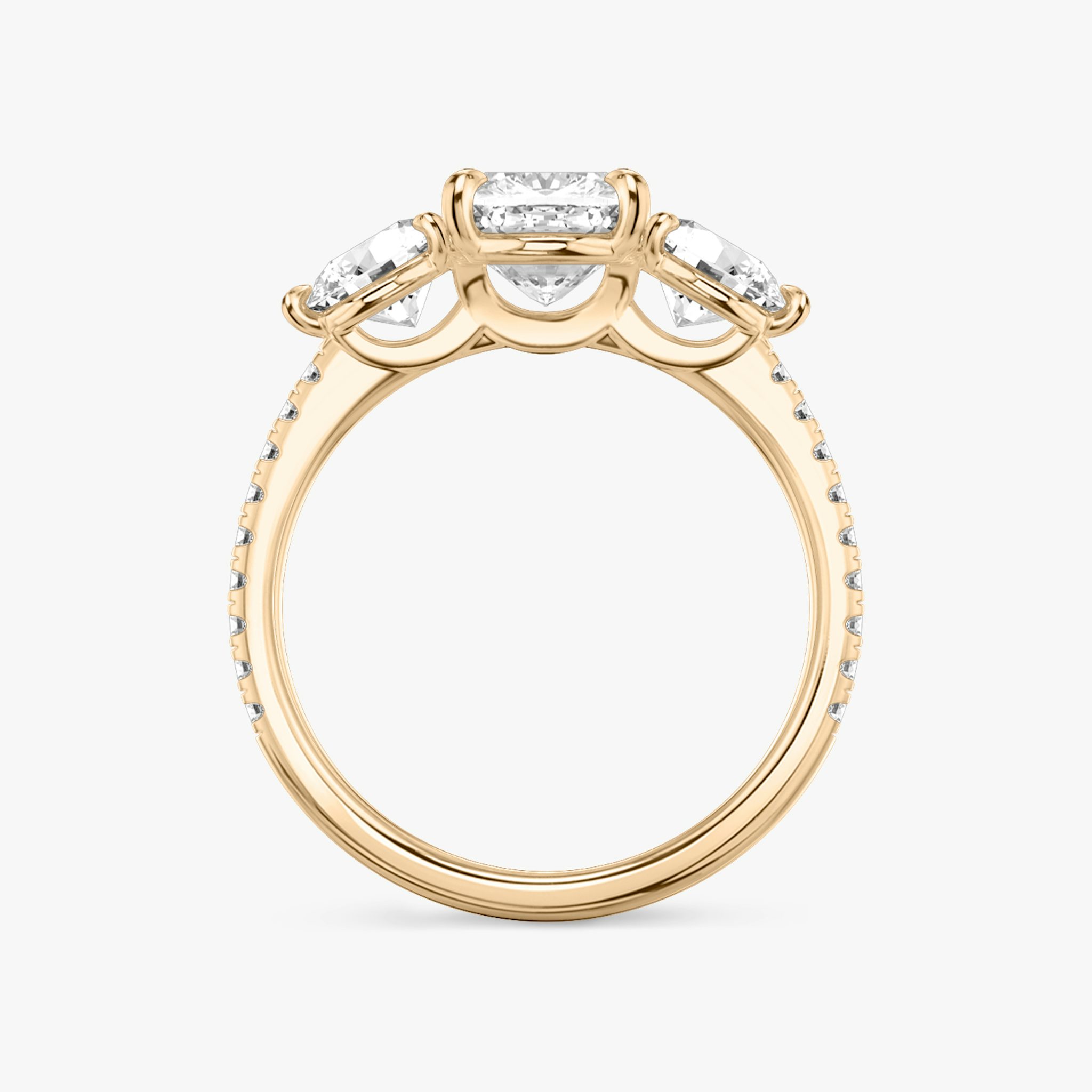The Three Stone | Cushion | 14k | Rose Gold | bandAccent: Pavé | sideStoneCarat: 0.50ct | sideStoneShape: Round Brilliant | diamondOrientation: vertical | caratWeight: other