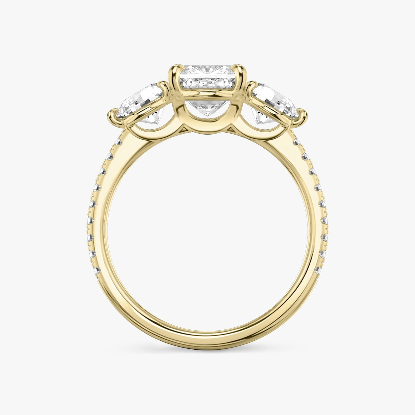 The Three Stone | Cushion | 18k | Yellow Gold | bandAccent: Pavé | sideStoneCarat: 0.50ct | sideStoneShape: Round Brilliant | diamondOrientation: vertical | caratWeight: other