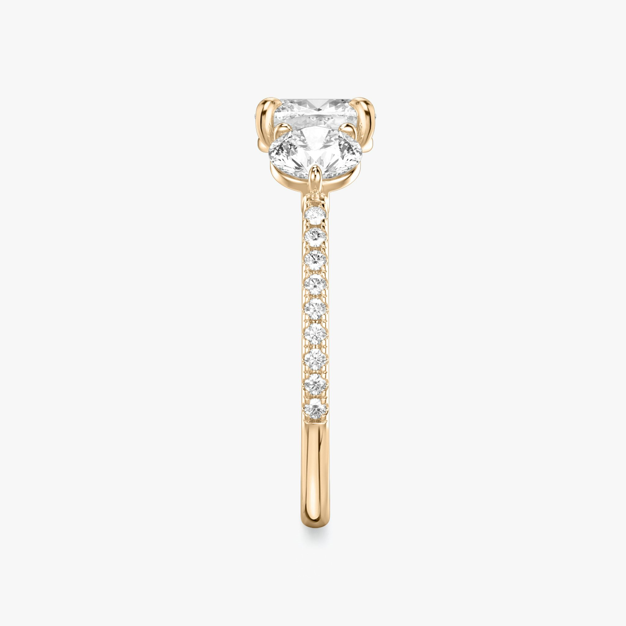 The Three Stone | Cushion | 14k | Rose Gold | bandAccent: Pavé | sideStoneCarat: 0.50ct | sideStoneShape: Round Brilliant | diamondOrientation: vertical | caratWeight: other