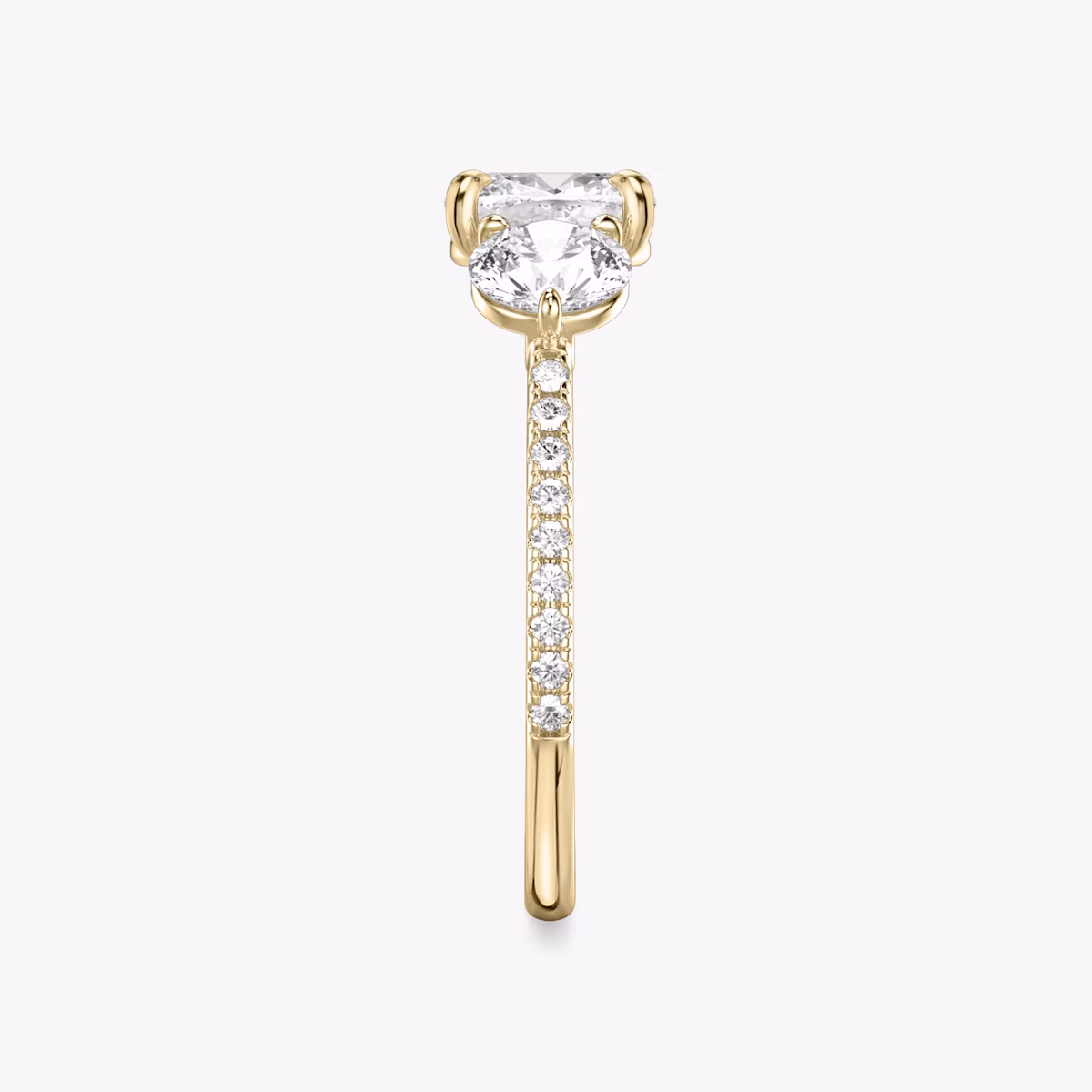 The Three Stone | Cushion | 18k | Yellow Gold | bandAccent: Pavé | sideStoneCarat: 0.50ct | sideStoneShape: Round Brilliant | diamondOrientation: vertical | caratWeight: other