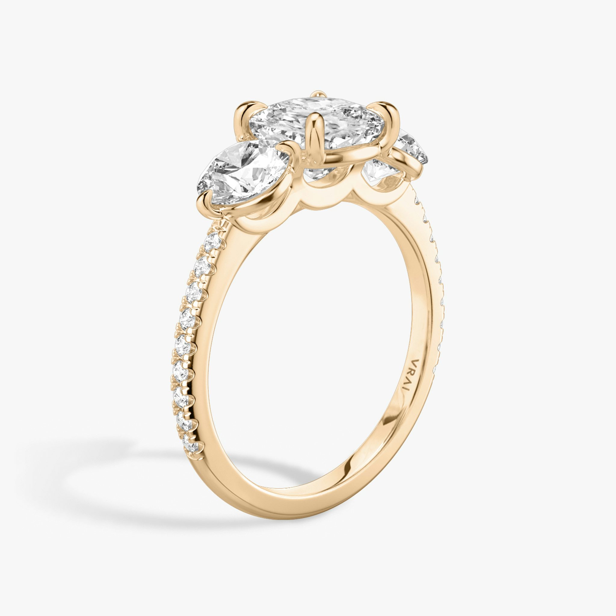 The Three Stone | Cushion | 14k | Rose Gold | bandAccent: Pavé | sideStoneCarat: 0.50ct | sideStoneShape: Round Brilliant | diamondOrientation: vertical | caratWeight: other