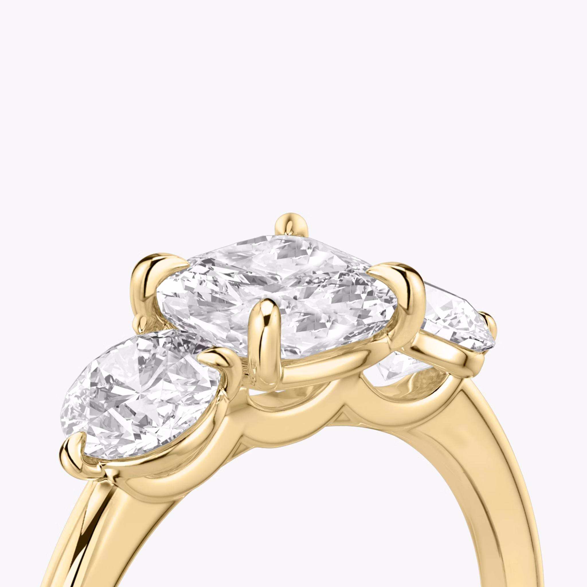 The Three Stone | Cushion | 18k | Yellow Gold | bandAccent: Plain | sideStoneCarat: 0.50ct | sideStoneShape: Round Brilliant | diamondOrientation: vertical | caratWeight: other