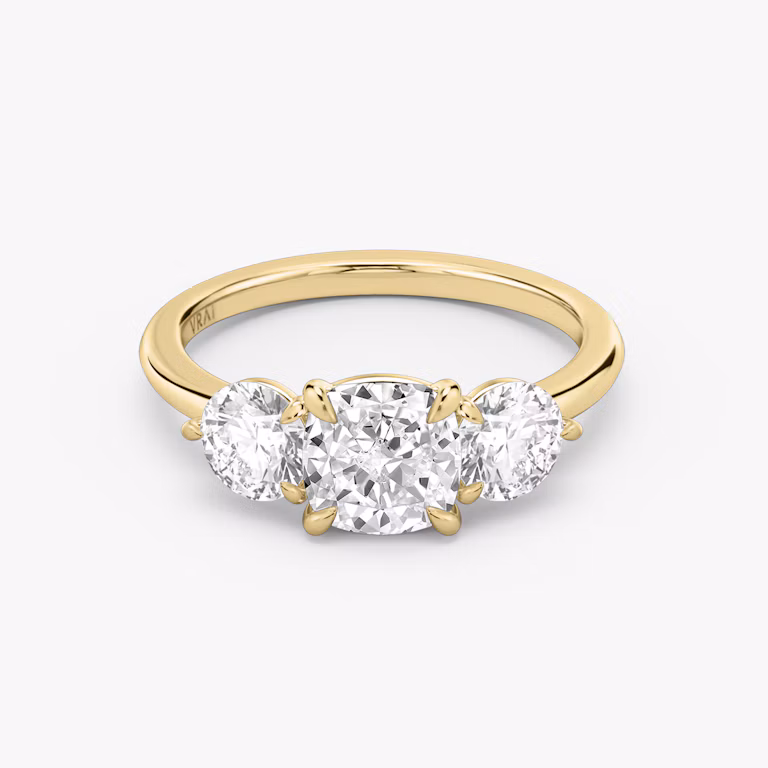 Three Stone Cushion and Round Brilliant RIng