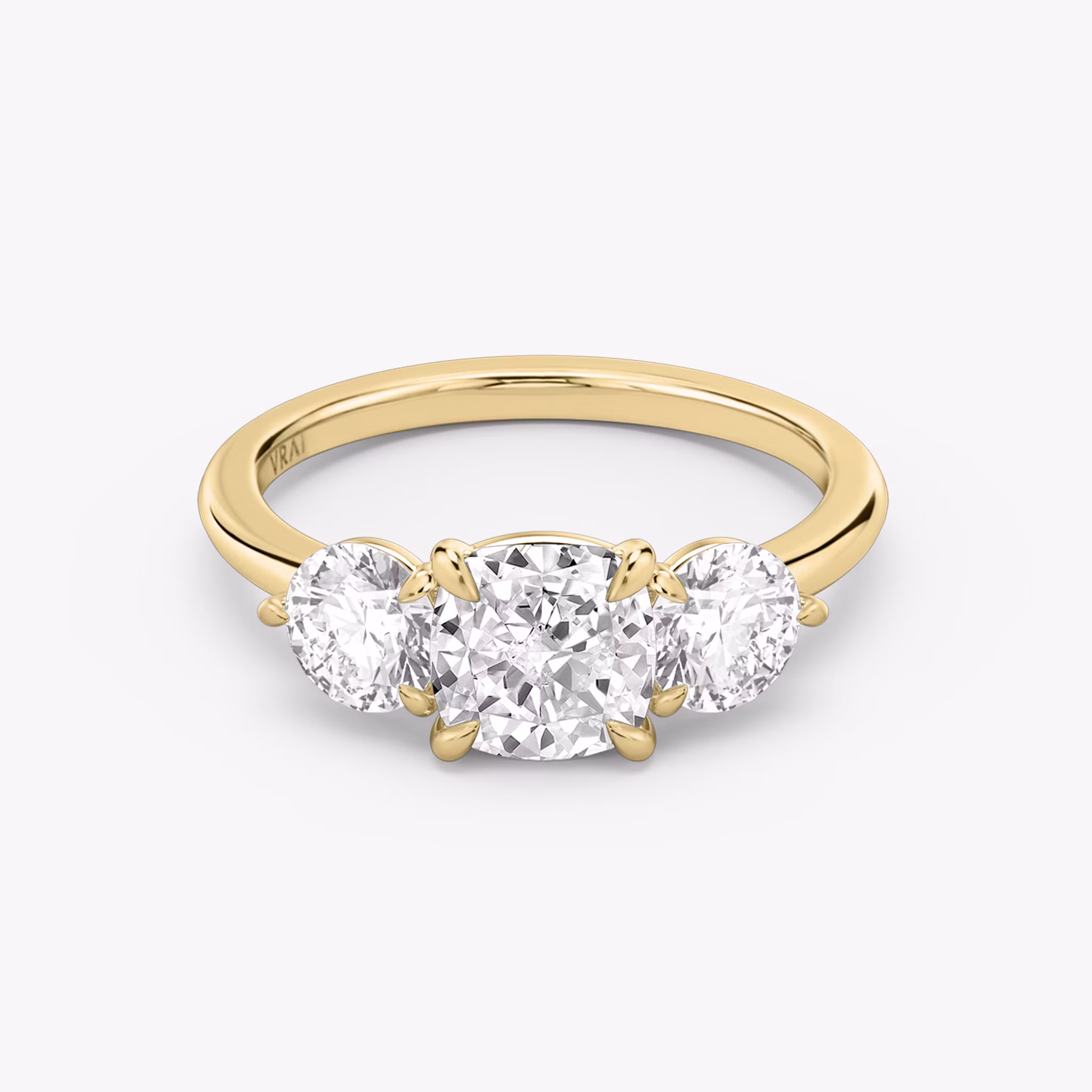 Three Stone Cushion and Round Brilliant RIng