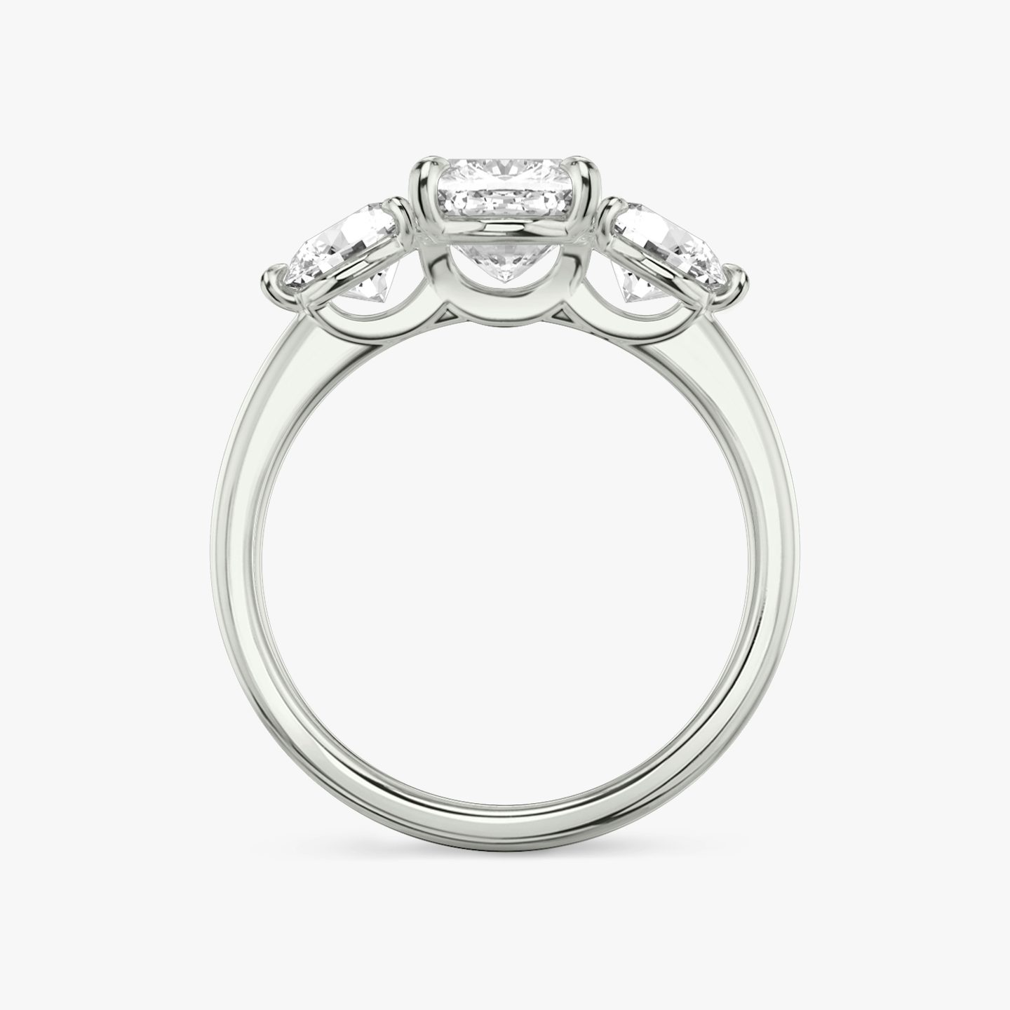 The Three Stone | Cushion | 18k | White Gold | bandAccent: Plain | sideStoneCarat: 0.50ct | sideStoneShape: Round Brilliant | diamondOrientation: vertical | caratWeight: other