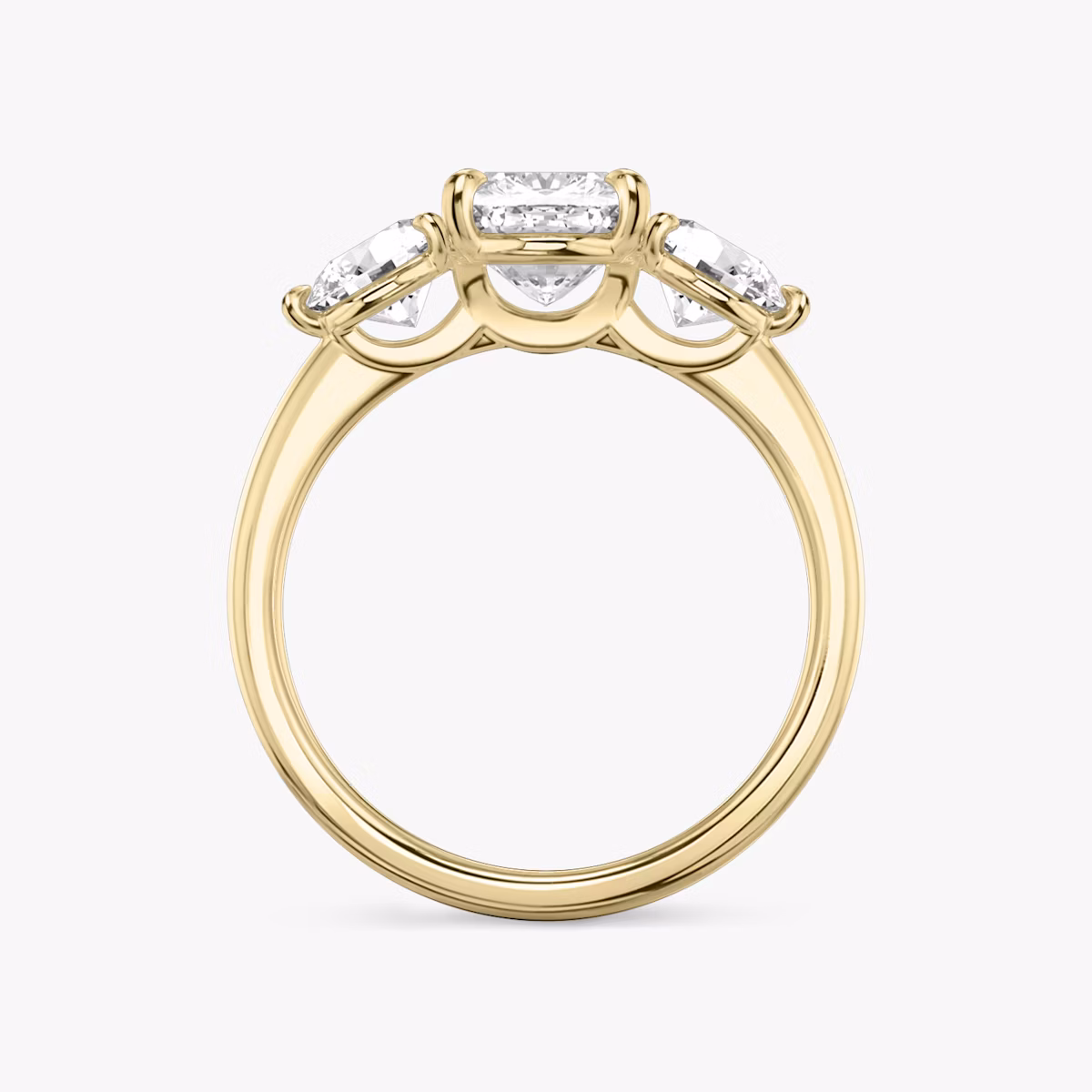The Three Stone | Cushion | 18k | Yellow Gold | bandAccent: Plain | sideStoneCarat: 0.50ct | sideStoneShape: Round Brilliant | diamondOrientation: vertical | caratWeight: other
