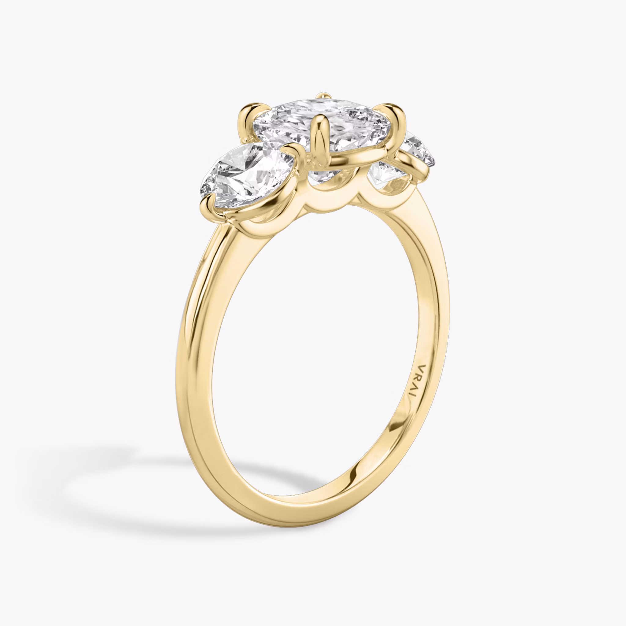 The Three Stone | Cushion | 18k | Yellow Gold | bandAccent: Plain | sideStoneCarat: 0.50ct | sideStoneShape: Round Brilliant | diamondOrientation: vertical | caratWeight: other