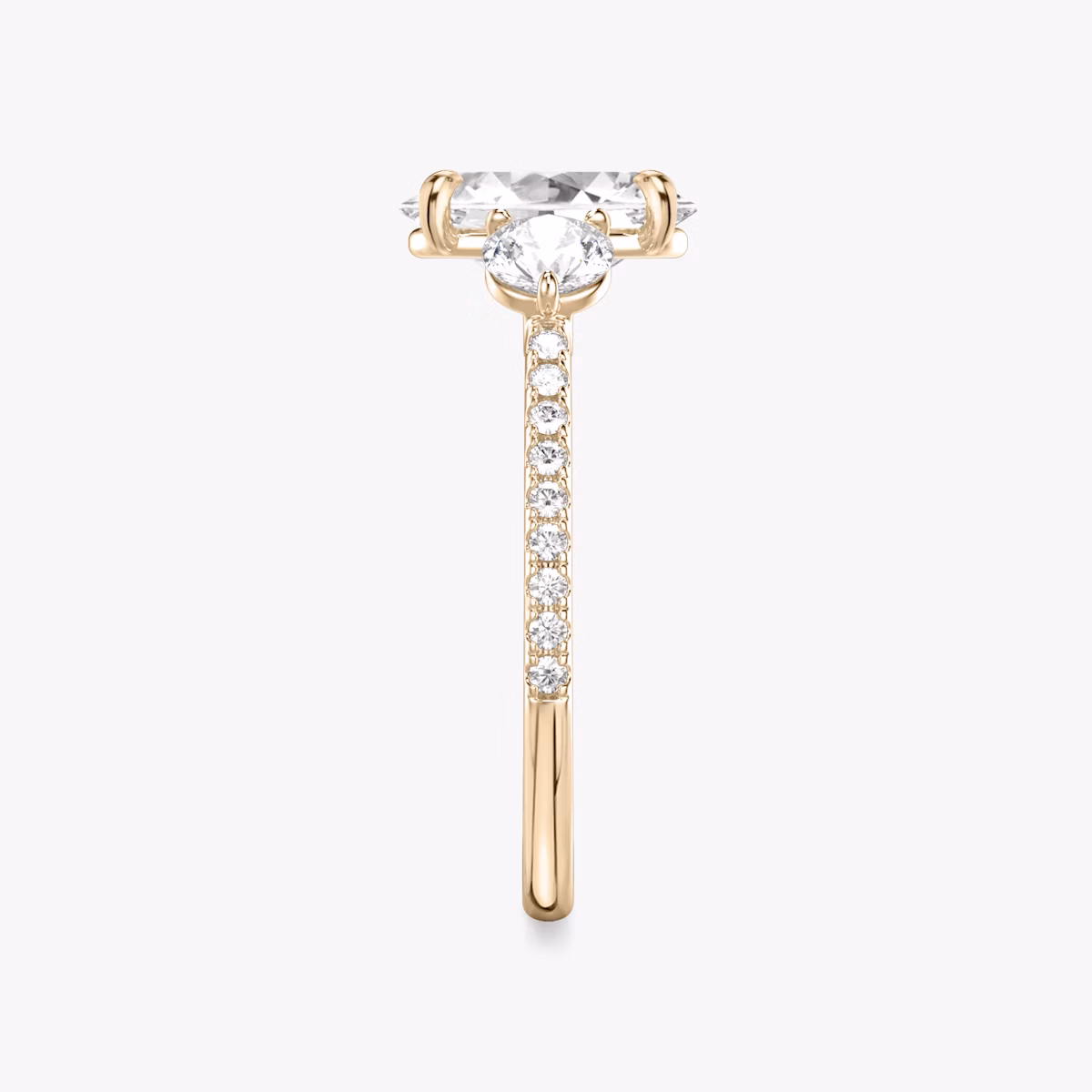 The Three Stone | Oval | 14k | Rose Gold | bandAccent: Pavé | sideStoneCarat: 0.25ct | sideStoneShape: Round Brilliant | diamondOrientation: vertical | caratWeight: other