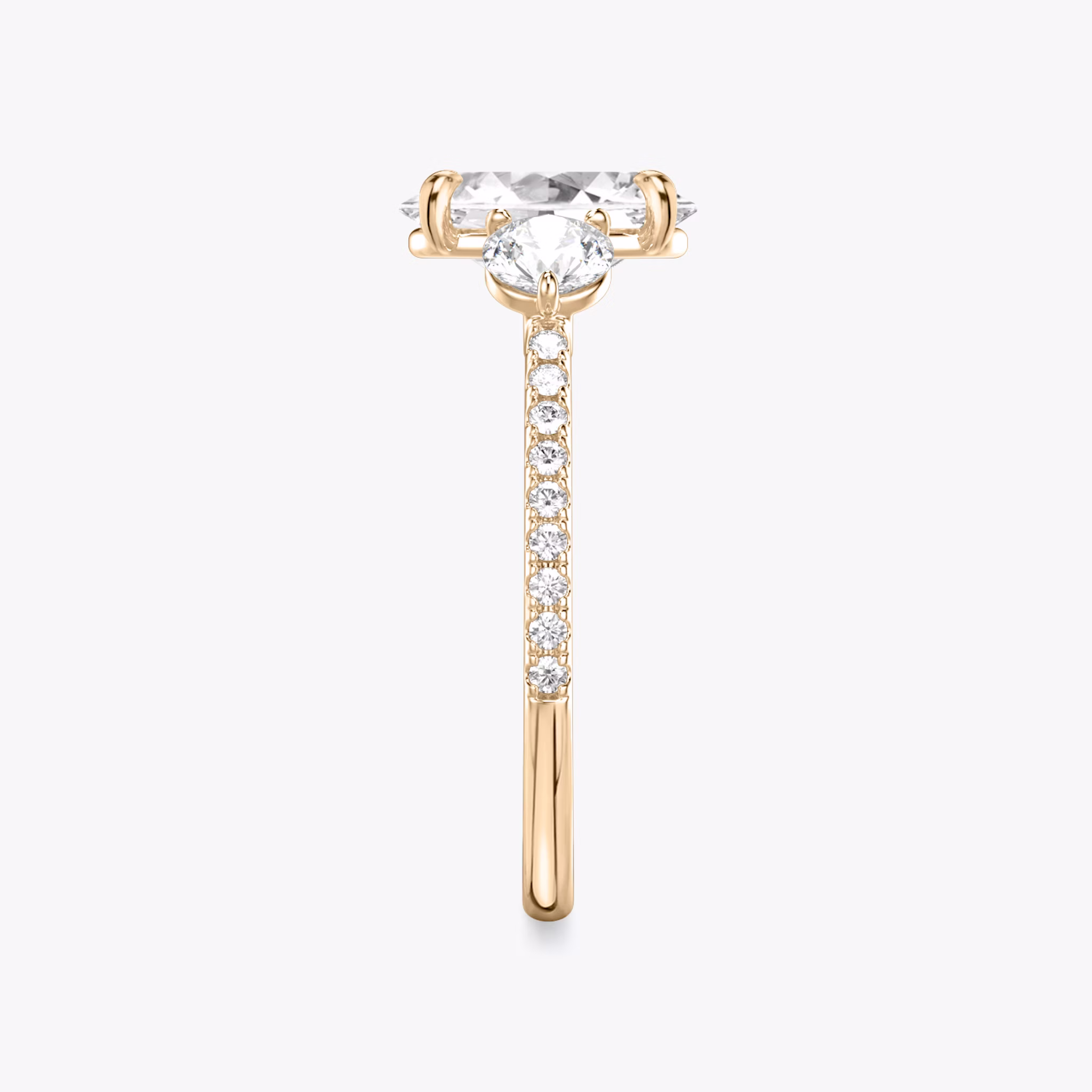 The Three Stone | Oval | 14k | Rose Gold | bandAccent: Pavé | sideStoneCarat: 0.25ct | sideStoneShape: Round Brilliant | diamondOrientation: vertical | caratWeight: other