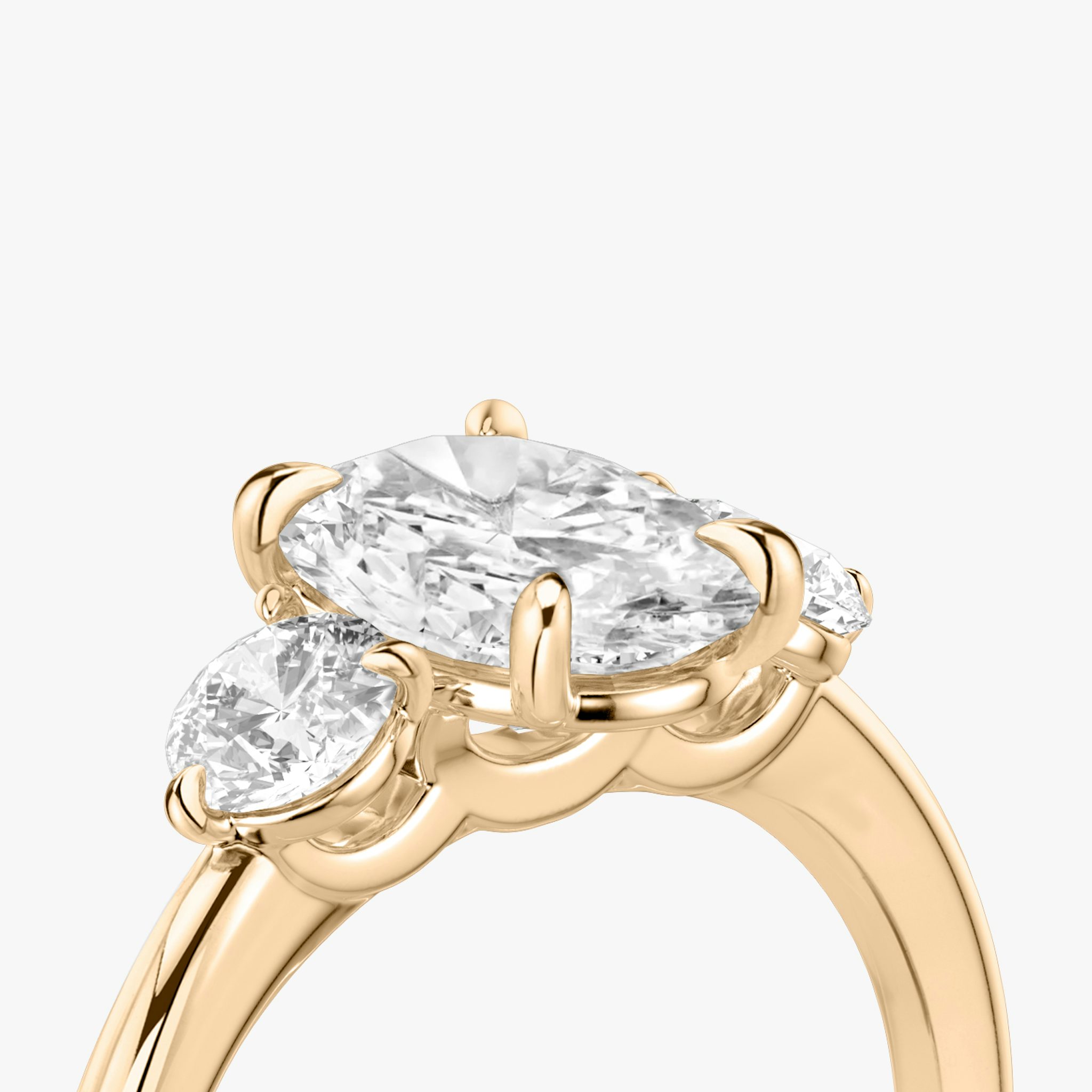 The Three Stone | Oval | 14k | Rose Gold | bandAccent: Plain | sideStoneCarat: 0.25ct | sideStoneShape: Round Brilliant | diamondOrientation: vertical | caratWeight: other