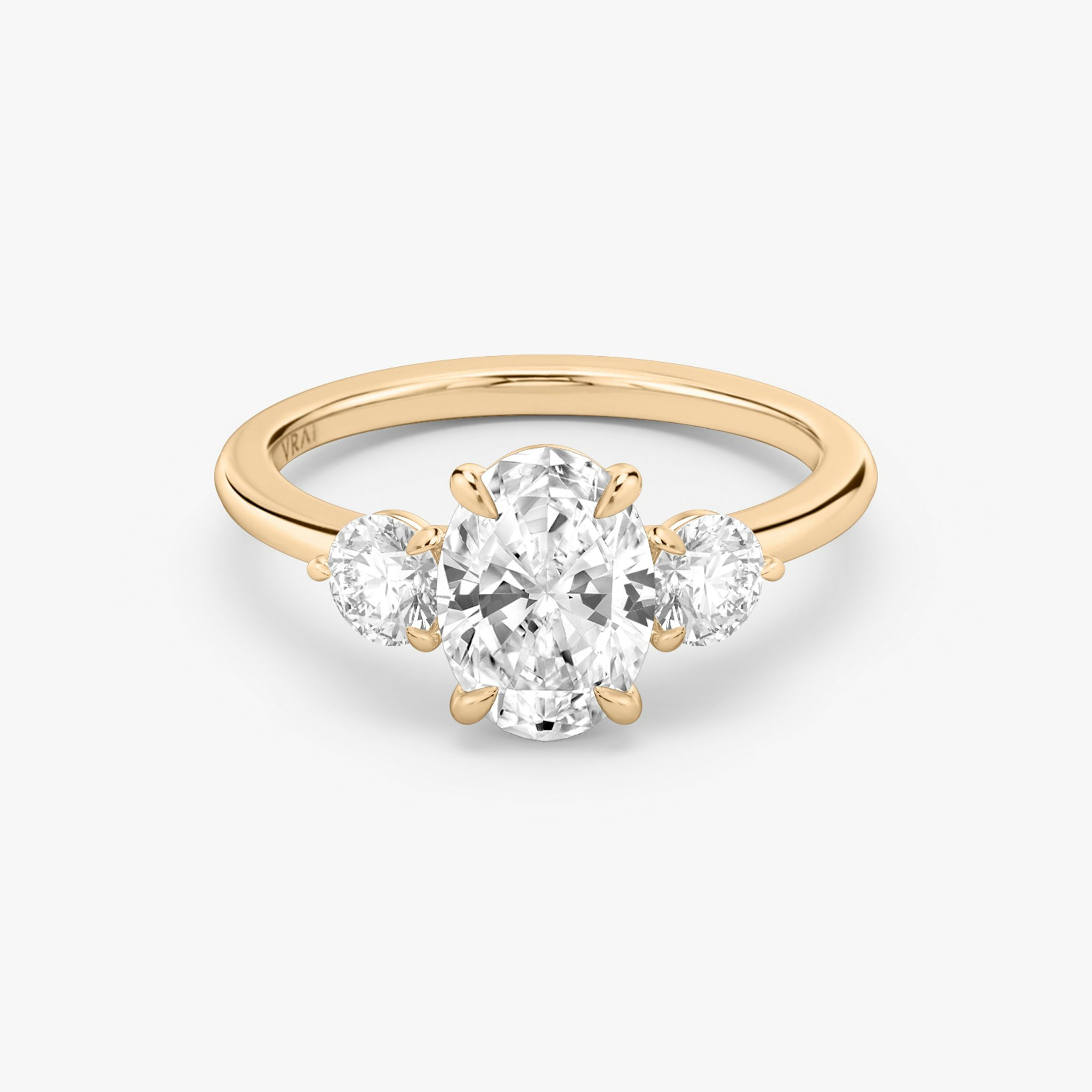 The Three Stone | Oval | 14k | Rose Gold | bandAccent: Plain | sideStoneCarat: 0.25ct | sideStoneShape: Round Brilliant | diamondOrientation: vertical | caratWeight: other