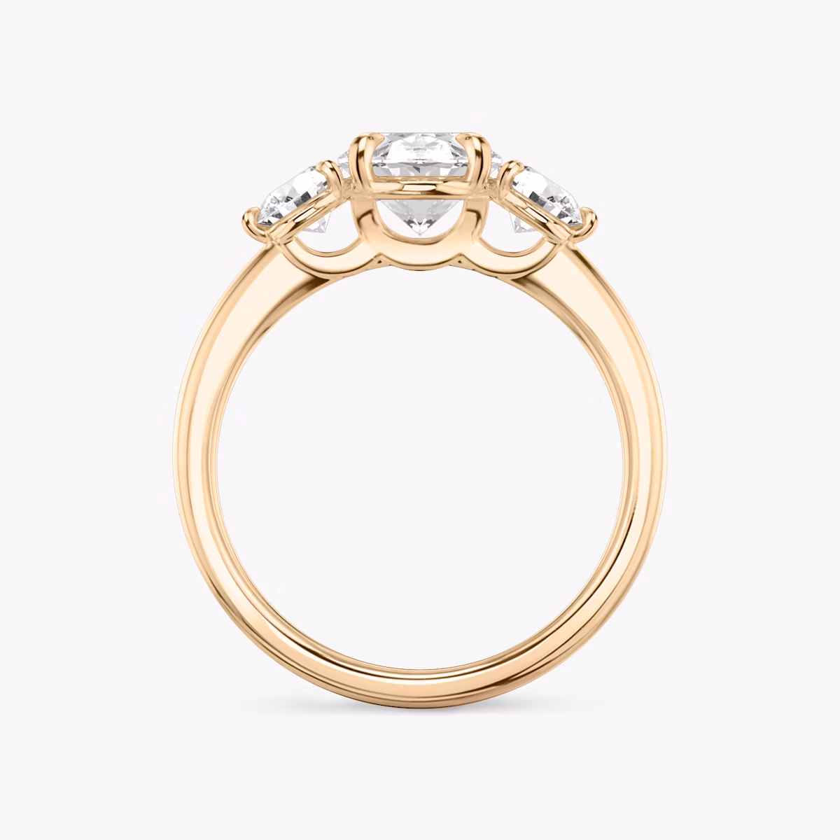 The Three Stone | Oval | 14k | Rose Gold | bandAccent: Plain | sideStoneCarat: 0.25ct | sideStoneShape: Round Brilliant | diamondOrientation: vertical | caratWeight: other